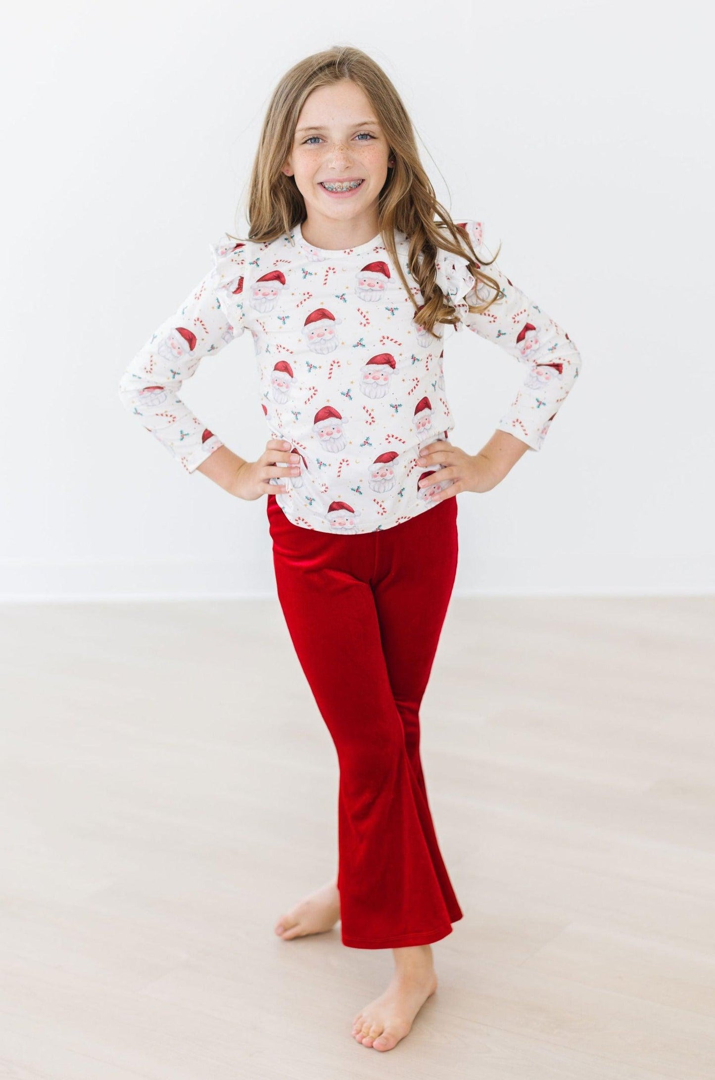 Mila & Rose ® Mistletoe Magic Long Sleeve Ruffle Tee Mila And Rose - Apparel & Accessories > Clothing > Clothing Tops > T-Shirts Ruffle Tee L/S