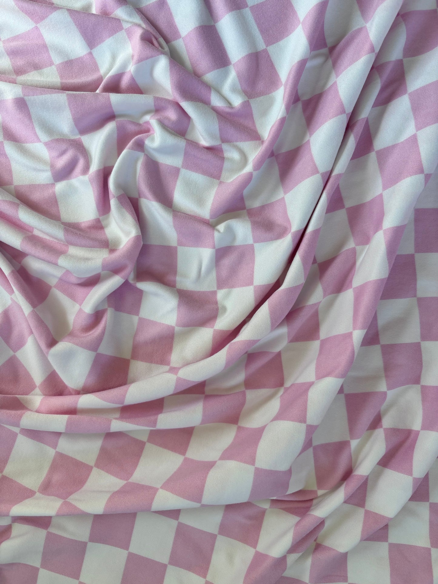 Sugar Pink And White Checkered Stretch Swaddle For Newborn Little Mae & Co Everetts Place: Online Boutique