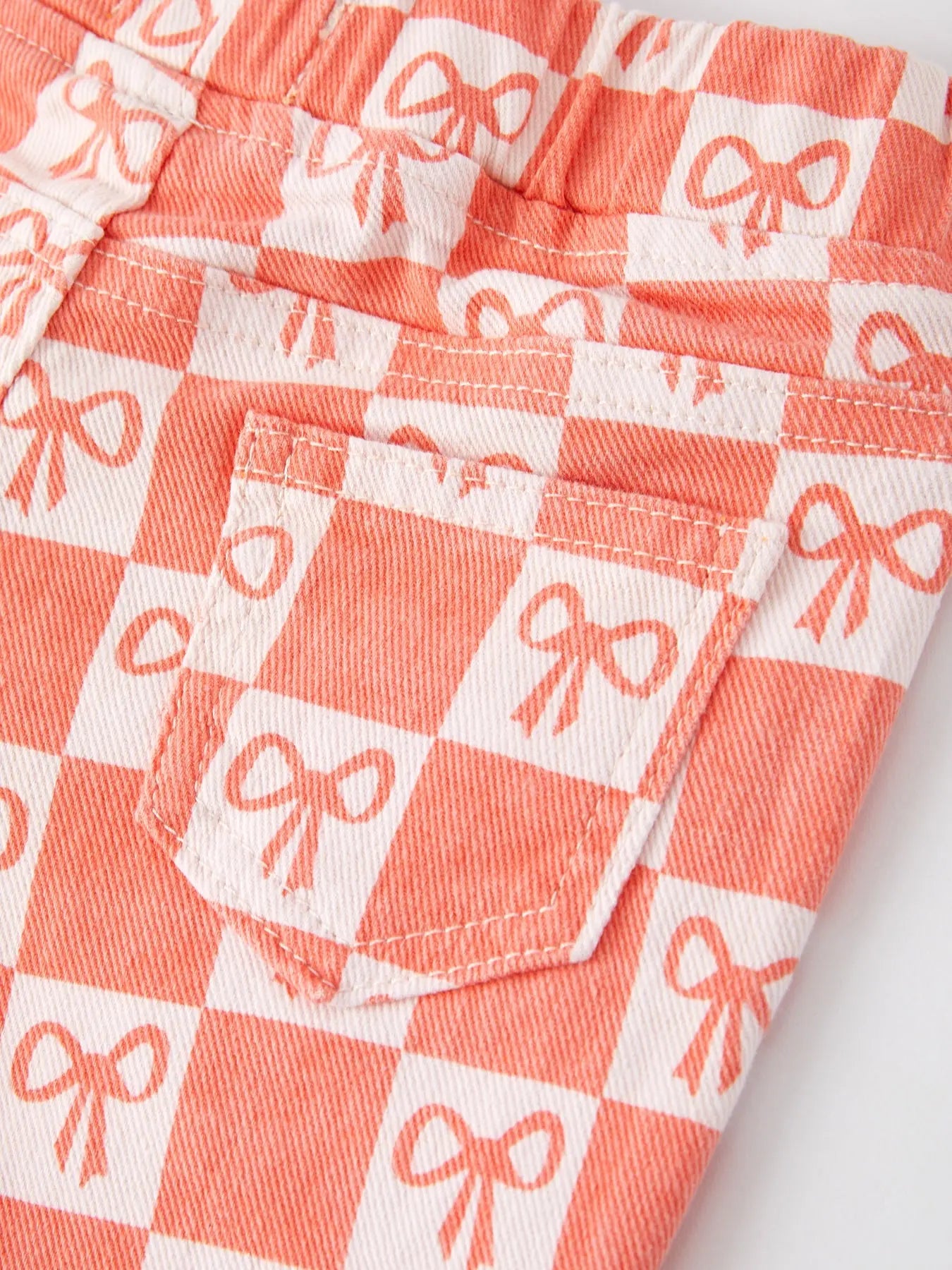 Girls Orange Bow Print Plaid Flared Jeans Rylee Faith Designs