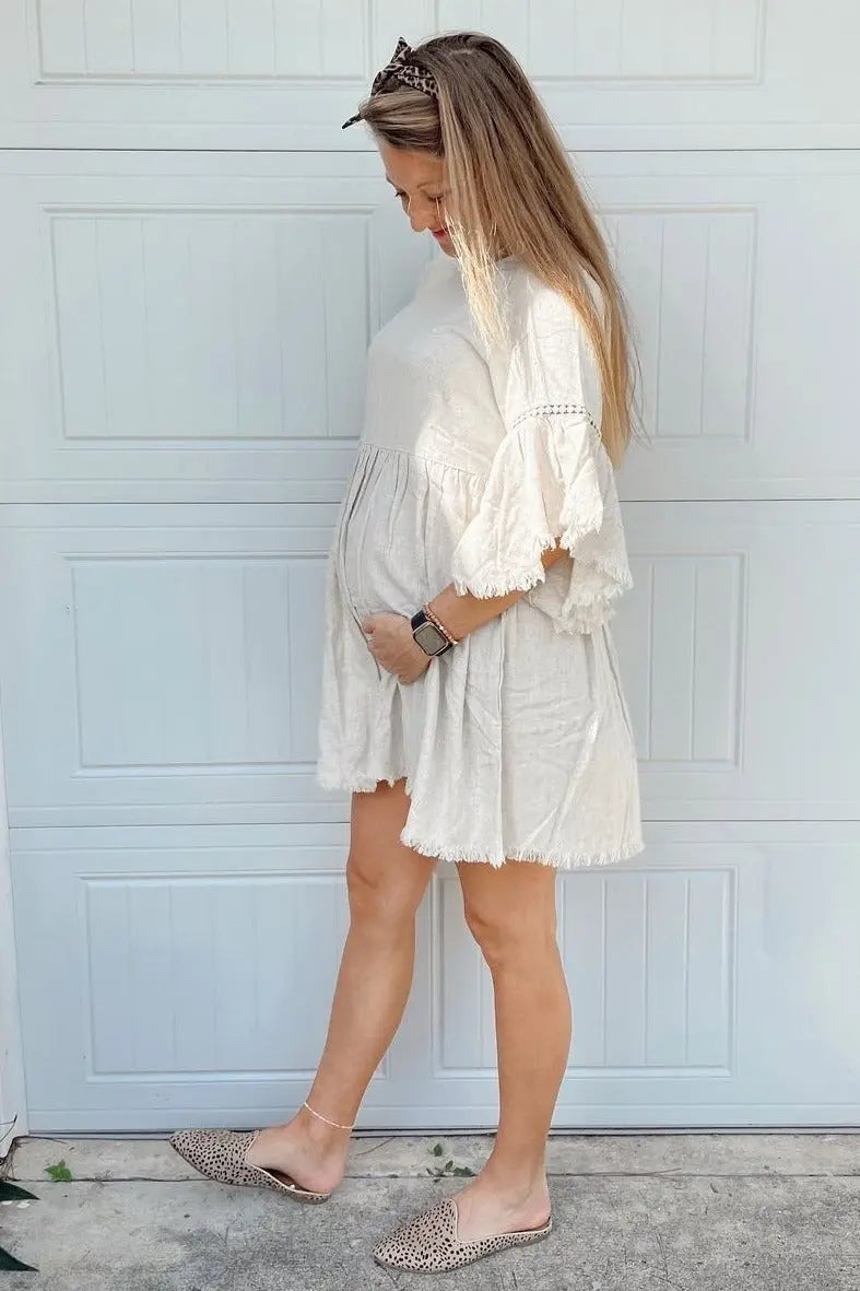 Beige Raw Edge Bell Sleeve Babydoll Maternity Dress with Crochet Trim and Back Keyhole Cutout PinkBlush