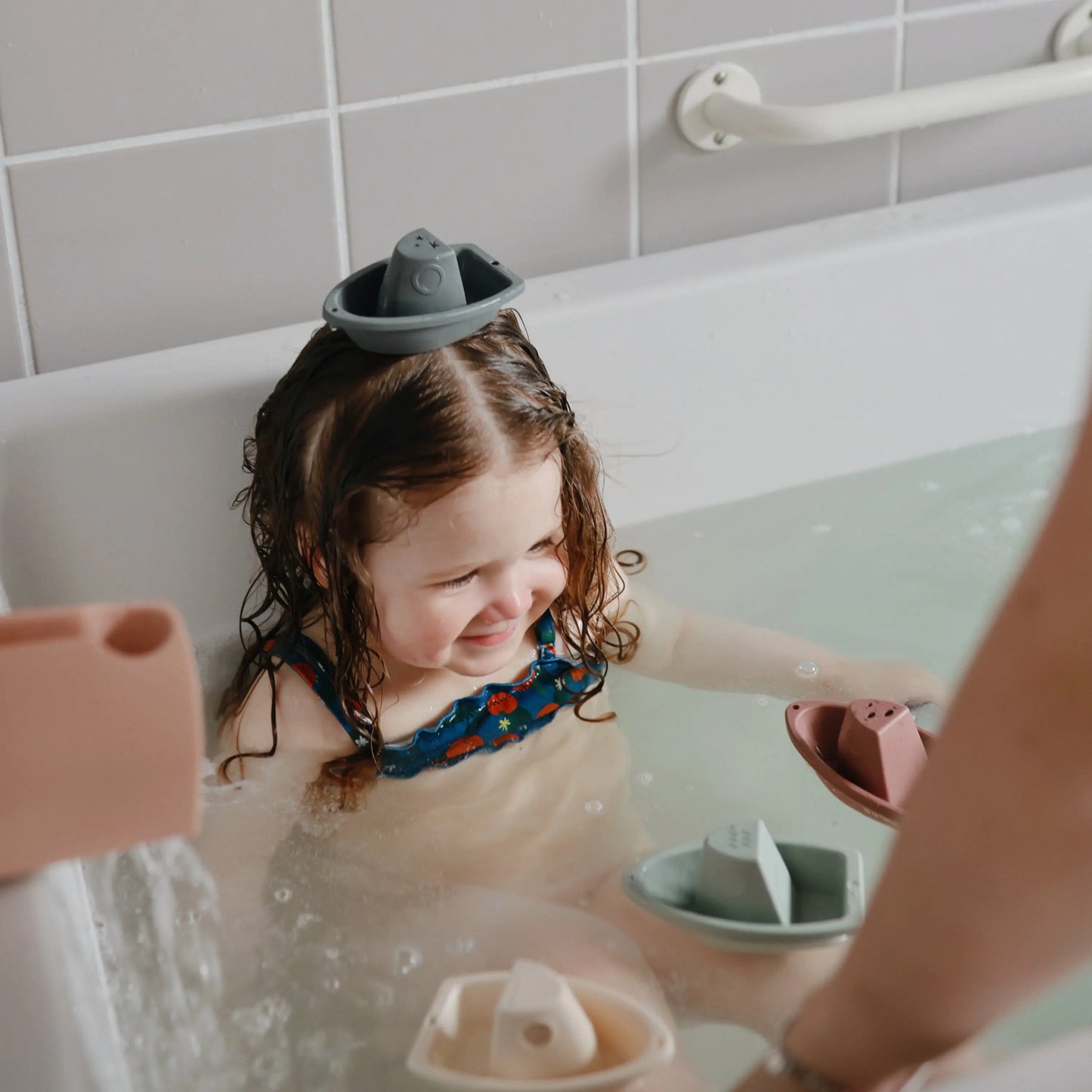 Bath Spout Cover with Playful Rainbow Arches for Child Safety and Fun Mushie Everetts Place: Online Boutique