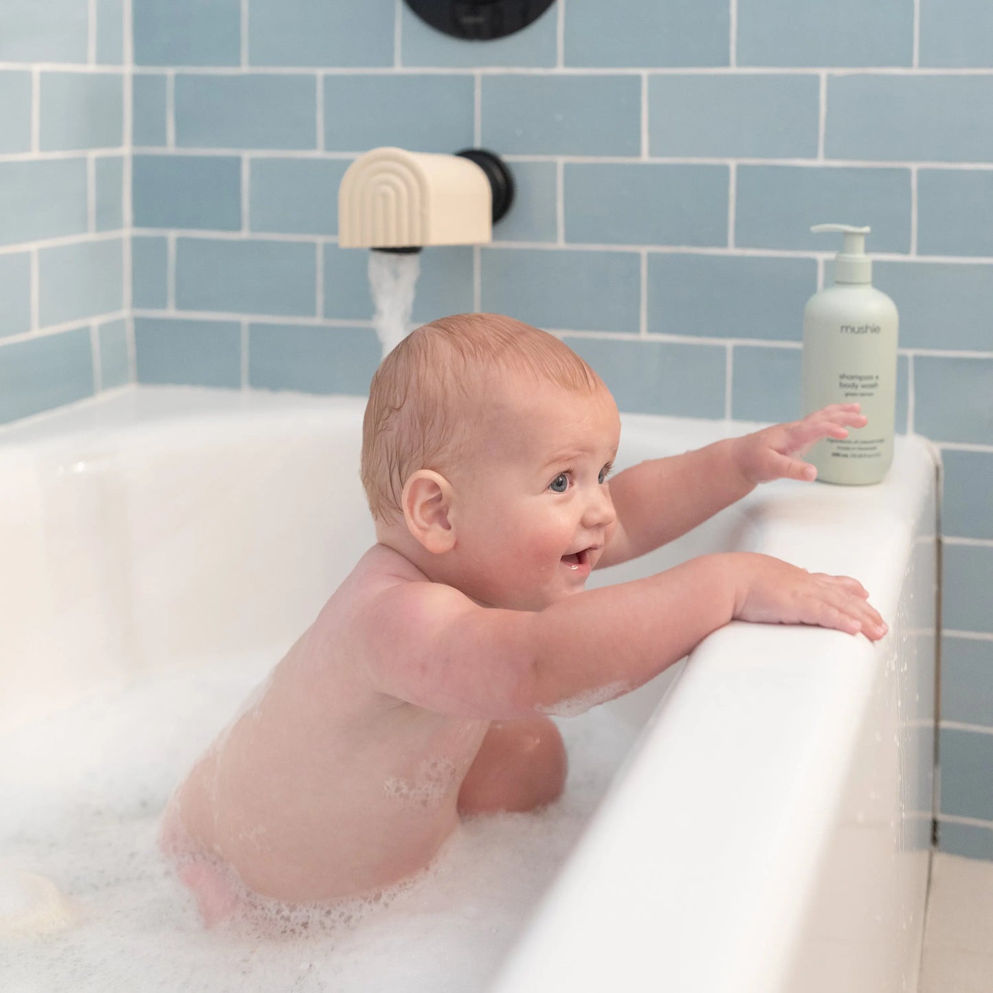 Bath Spout Cover with Playful Rainbow Arches for Child Safety and Fun Mushie Everetts Place: Online Boutique