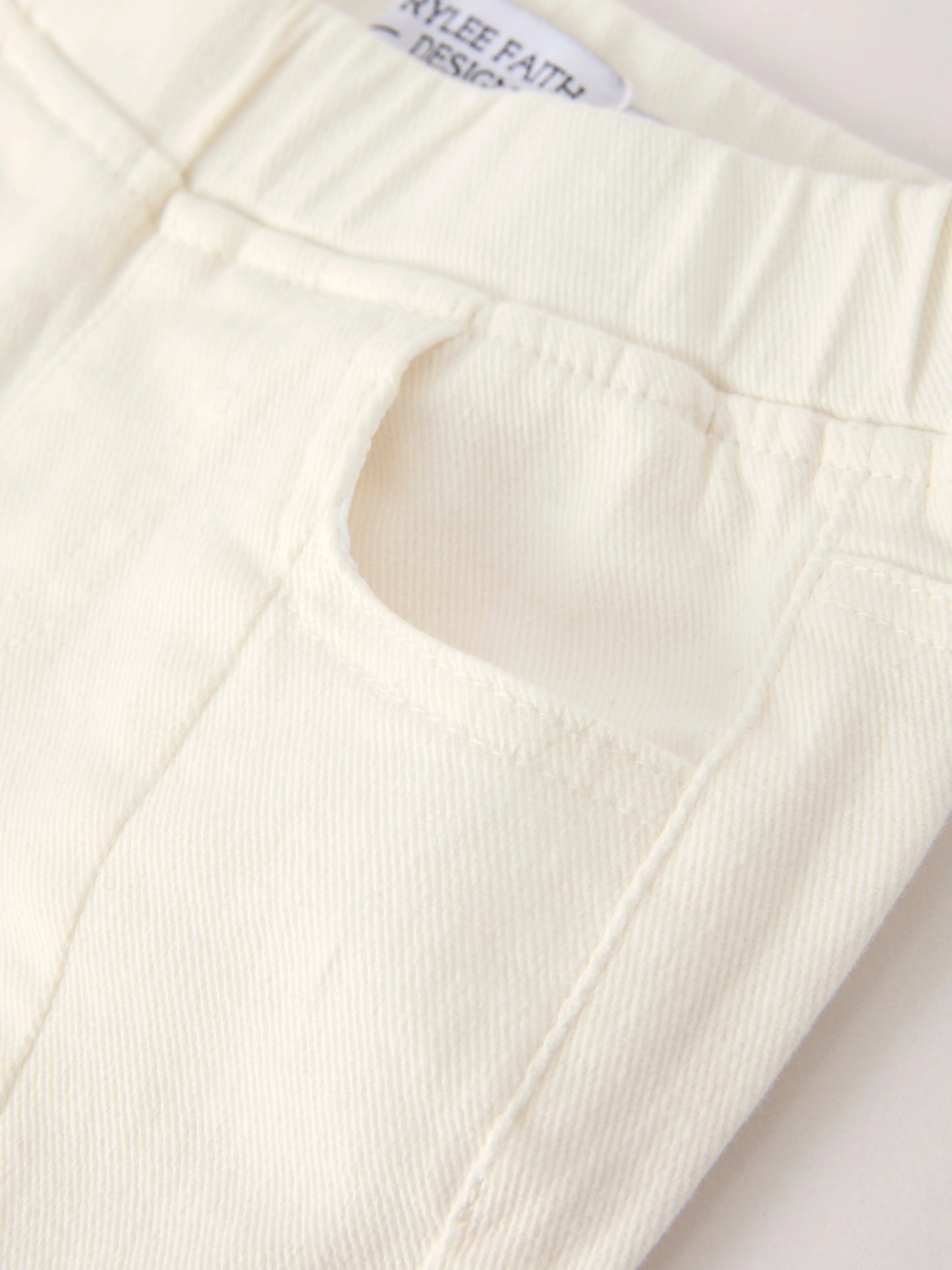 Christmas Charming White Bell Bottom Pants With Cute Bows - Everetts Place: Online Boutique