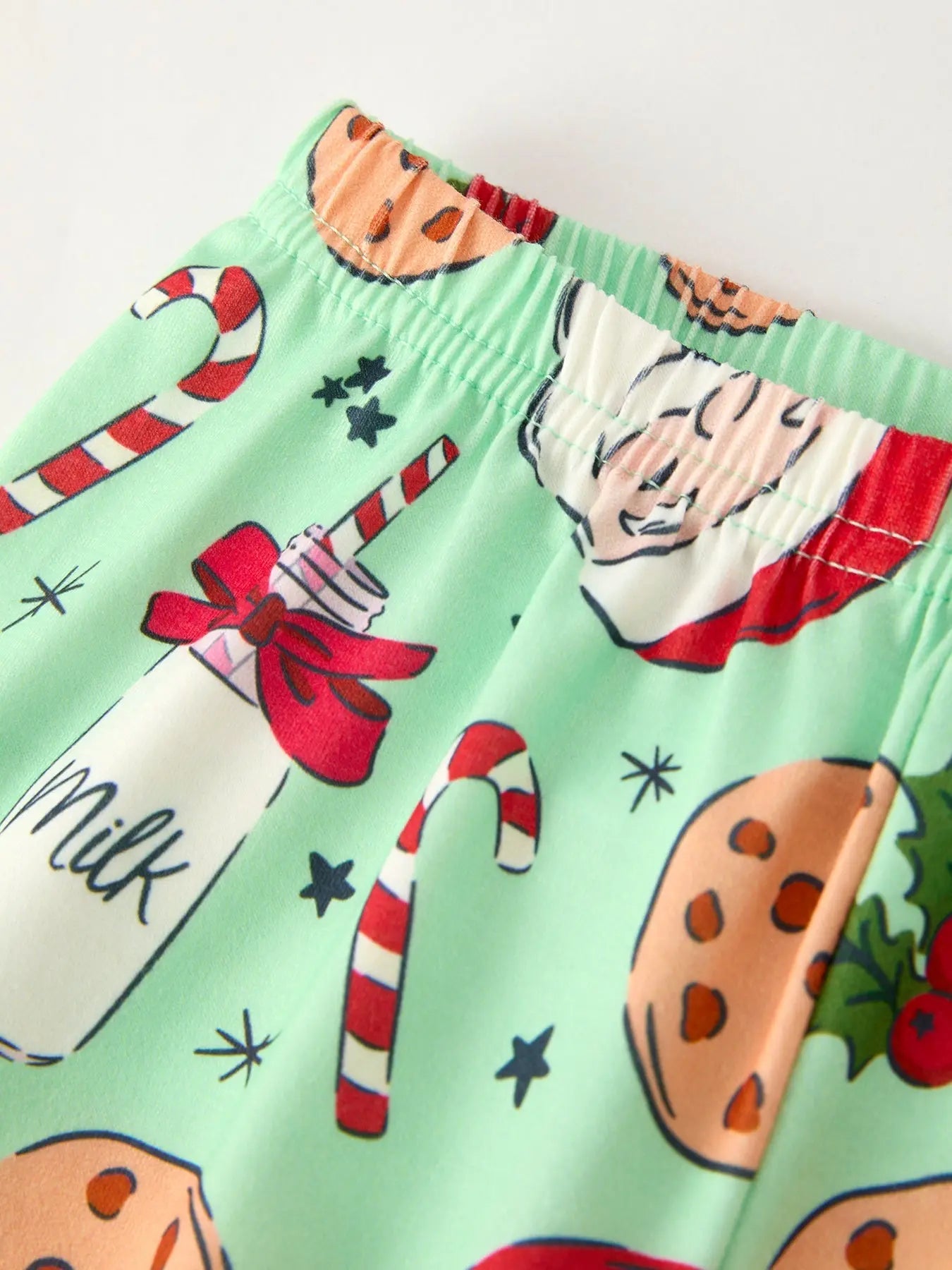 Christmas Santa and Cookie Print Girls Pajamas with Red Ruffle Rylee Faith Designs