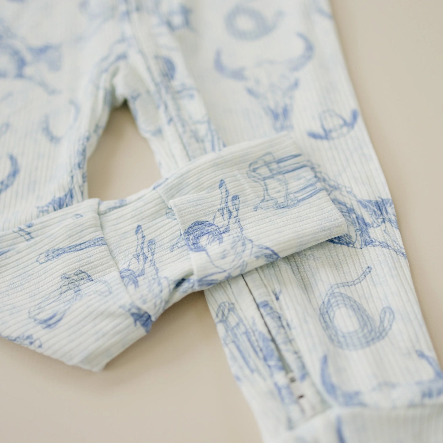 Little Joy Co. Cowboy Blues Ribbed Bamboo Zippy Pajamas for Babies - Apparel & Accessories > Clothing > Baby & Toddler Clothing > Baby & Toddler Sleepwear