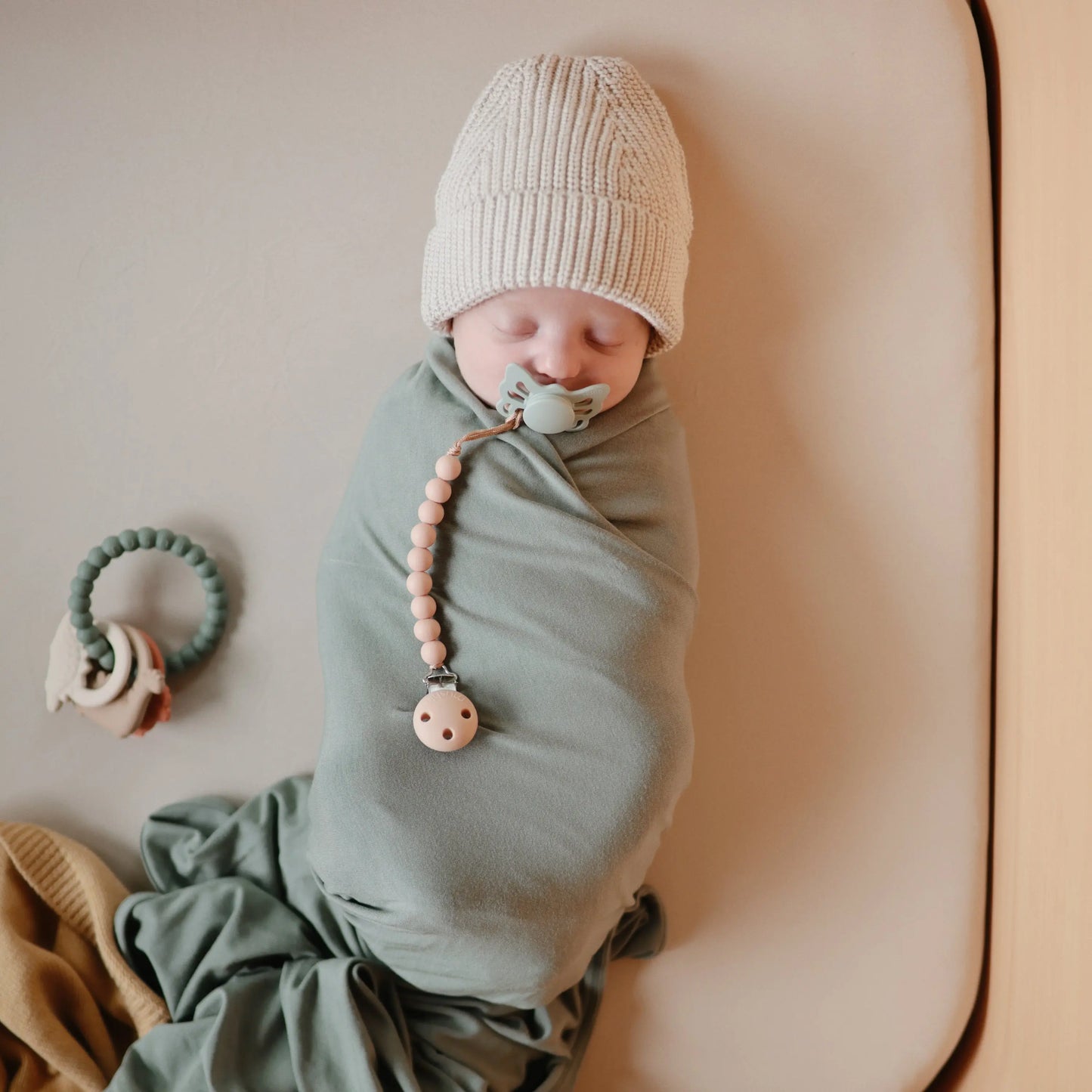 Dino Teething Ring with Sensory Shapes and Textures Mushie Everetts Place: Online Boutique
