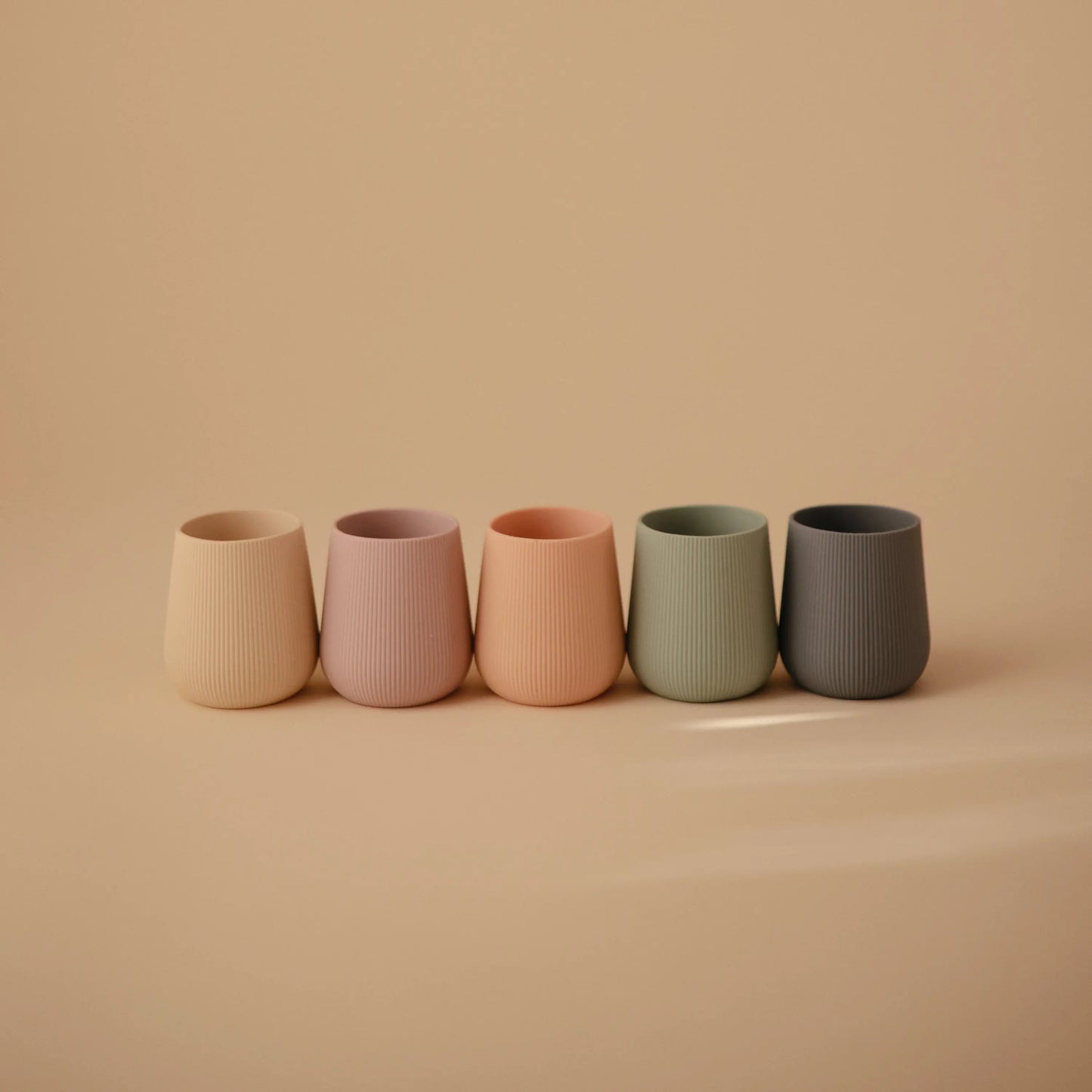 Silicone Starter Cup for Babies with Ribbed Texture and Weighted Base for Easy Transition from Bottle to Cup Mushie