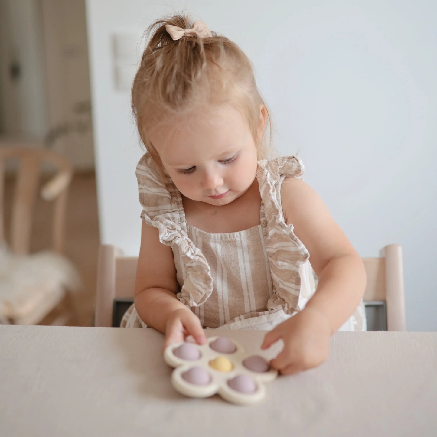 Flower Press Toy for Fine Motor Skills and Sensory Exploration Mushie Everetts Place: Online Boutique