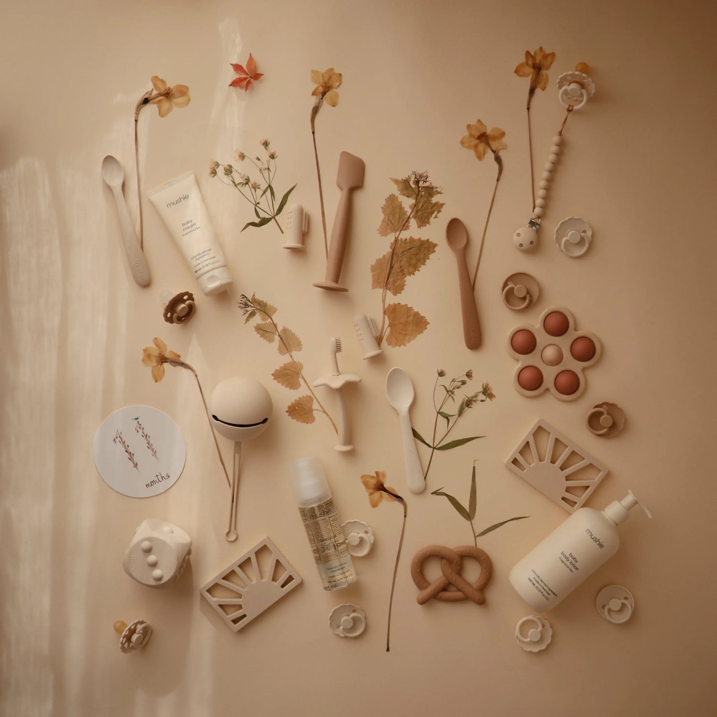 Flower Press Toy for Fine Motor Skills and Sensory Exploration Mushie Everetts Place: Online Boutique