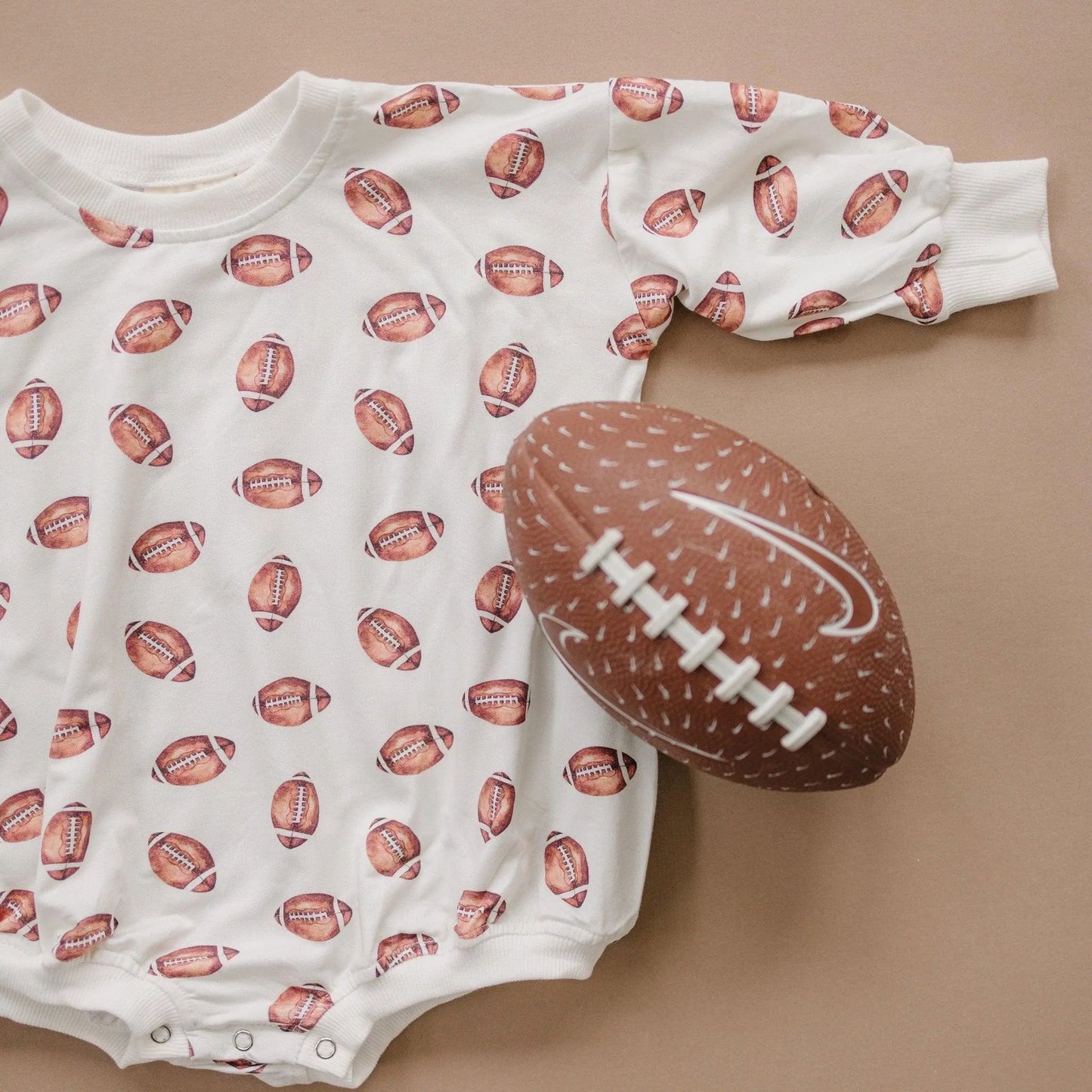 Little Joy Co. Football Print Bamboo Bubble Romper Unisex Baby Outfit - Apparel & Accessories > Clothing > Baby & Toddler Clothing > Baby One-Pieces