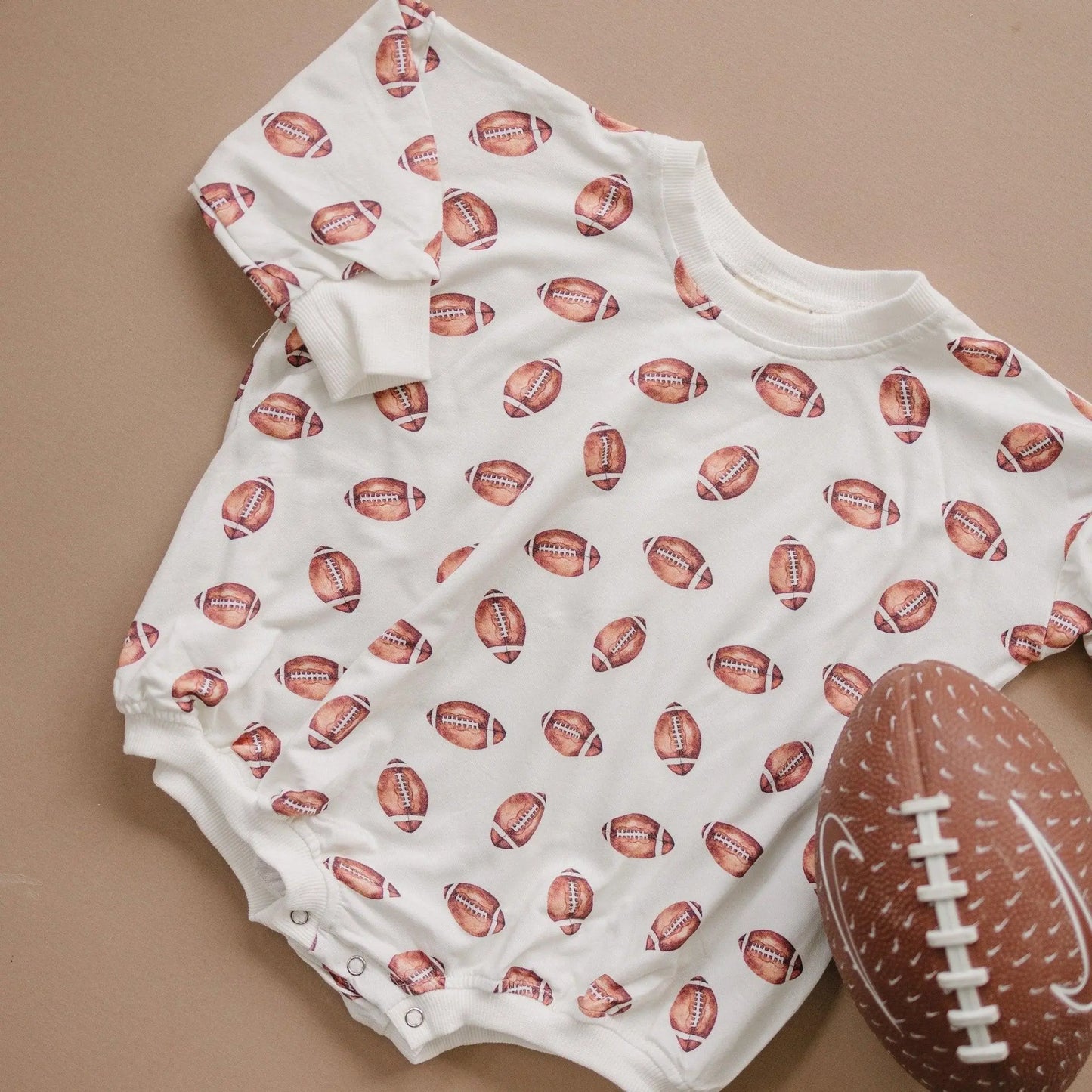 Little Joy Co. Football Print Bamboo Bubble Romper Unisex Baby Outfit - Apparel & Accessories > Clothing > Baby & Toddler Clothing > Baby One-Pieces