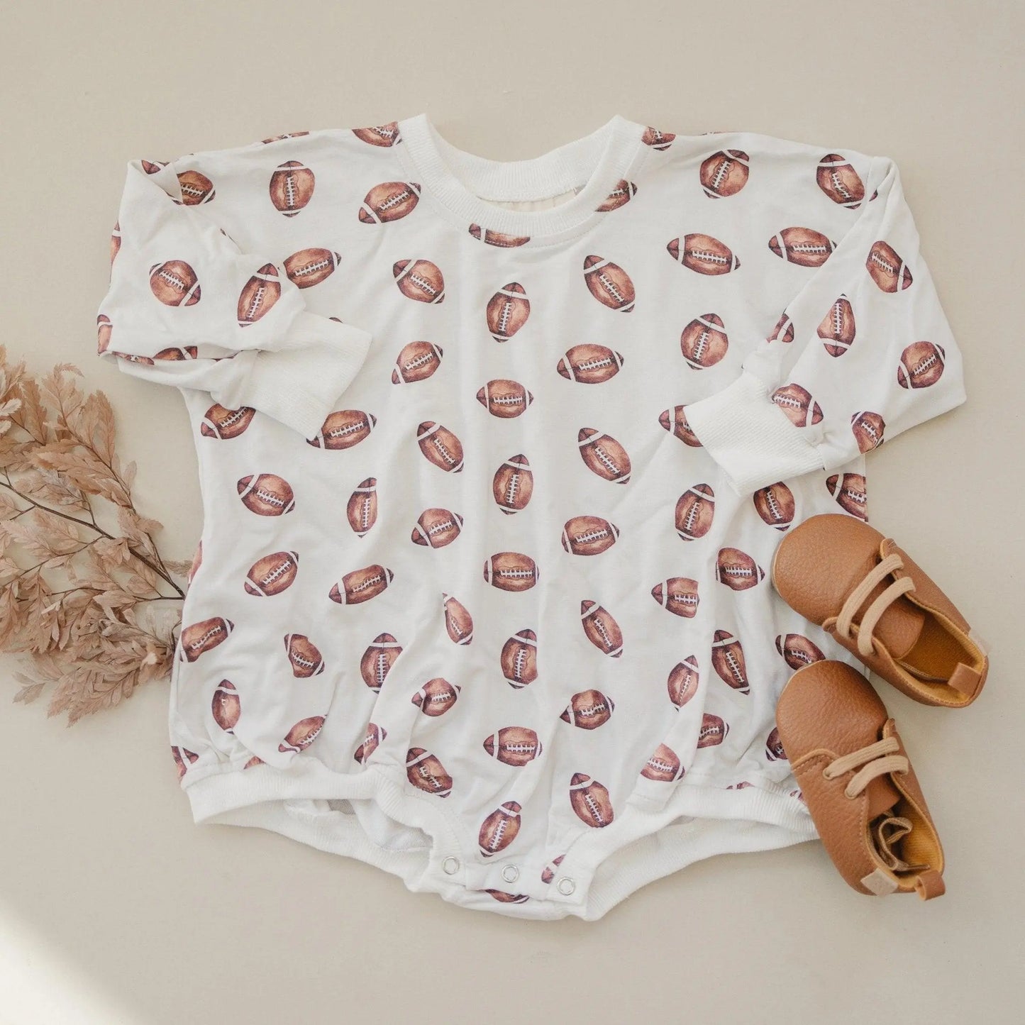 Little Joy Co. Football Print Bamboo Bubble Romper Unisex Baby Outfit - Apparel & Accessories > Clothing > Baby & Toddler Clothing > Baby One-Pieces