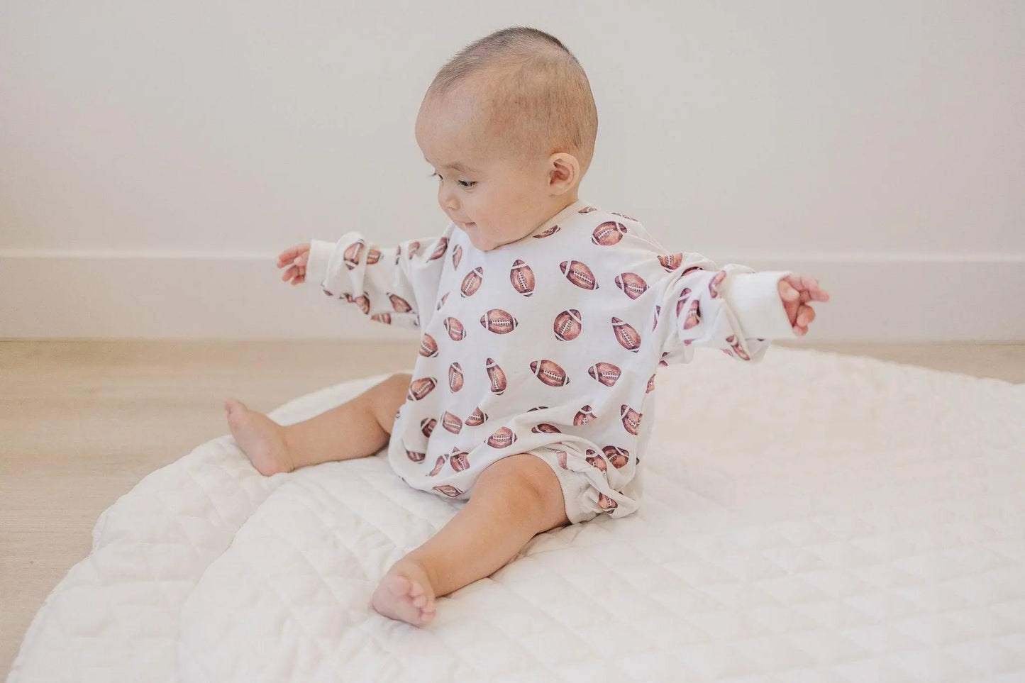 Little Joy Co. Football Print Bamboo Bubble Romper Unisex Baby Outfit - Apparel & Accessories > Clothing > Baby & Toddler Clothing > Baby One-Pieces