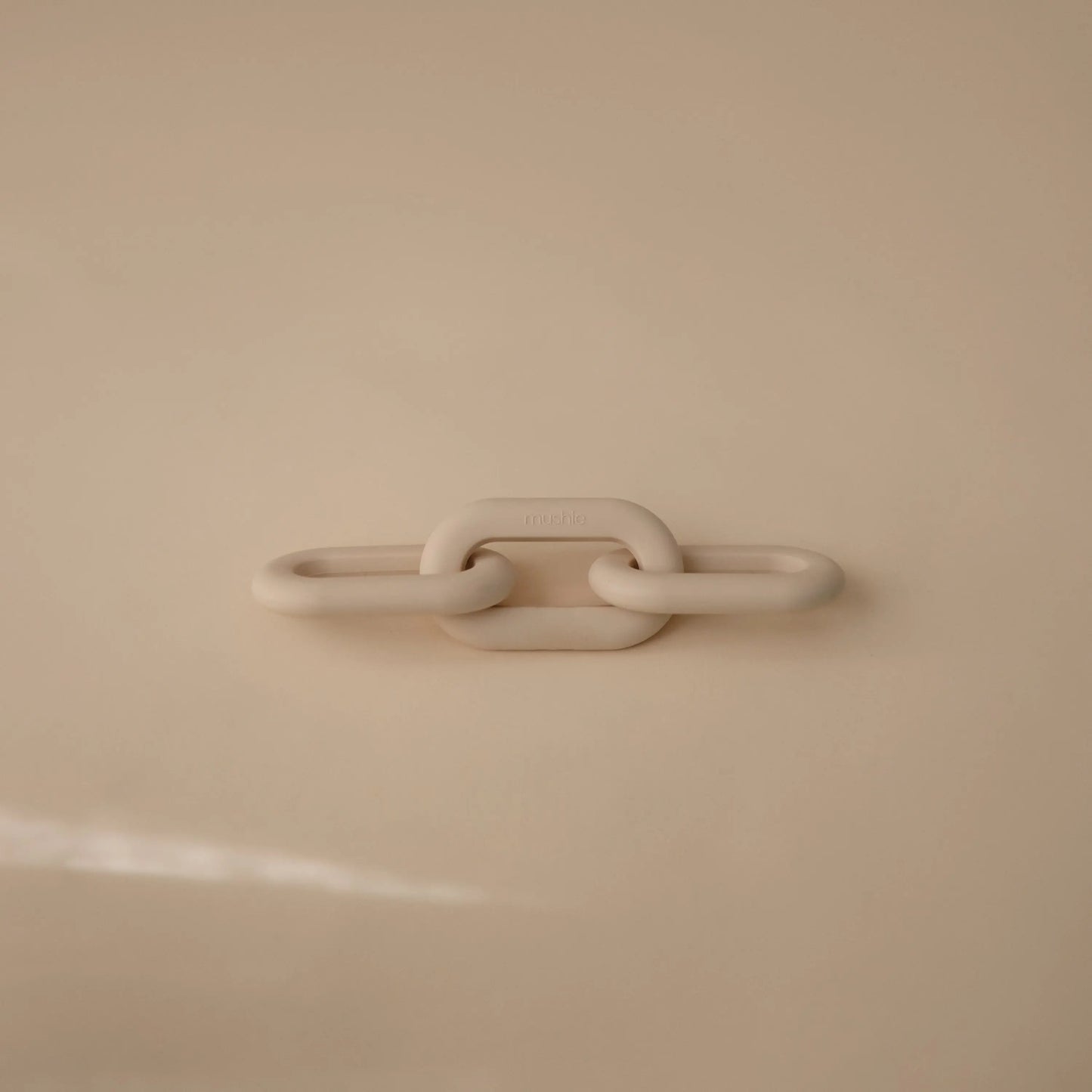 Links Teether Made from Food Grade Silicone for Sore Gums Relief and Comfort Mushie Everetts Place: Online Boutique
