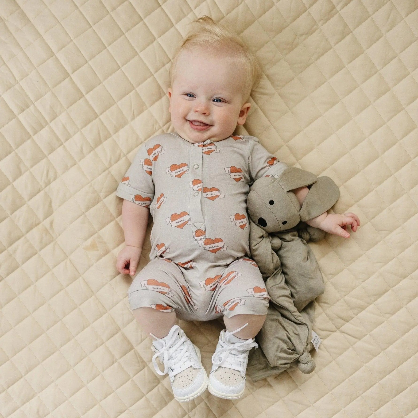 Little Joy Co. Mama Tattoo Hearts Bamboo Henley Romper for Babies - Apparel & Accessories > Clothing > Baby & Toddler Clothing > Baby One-Pieces