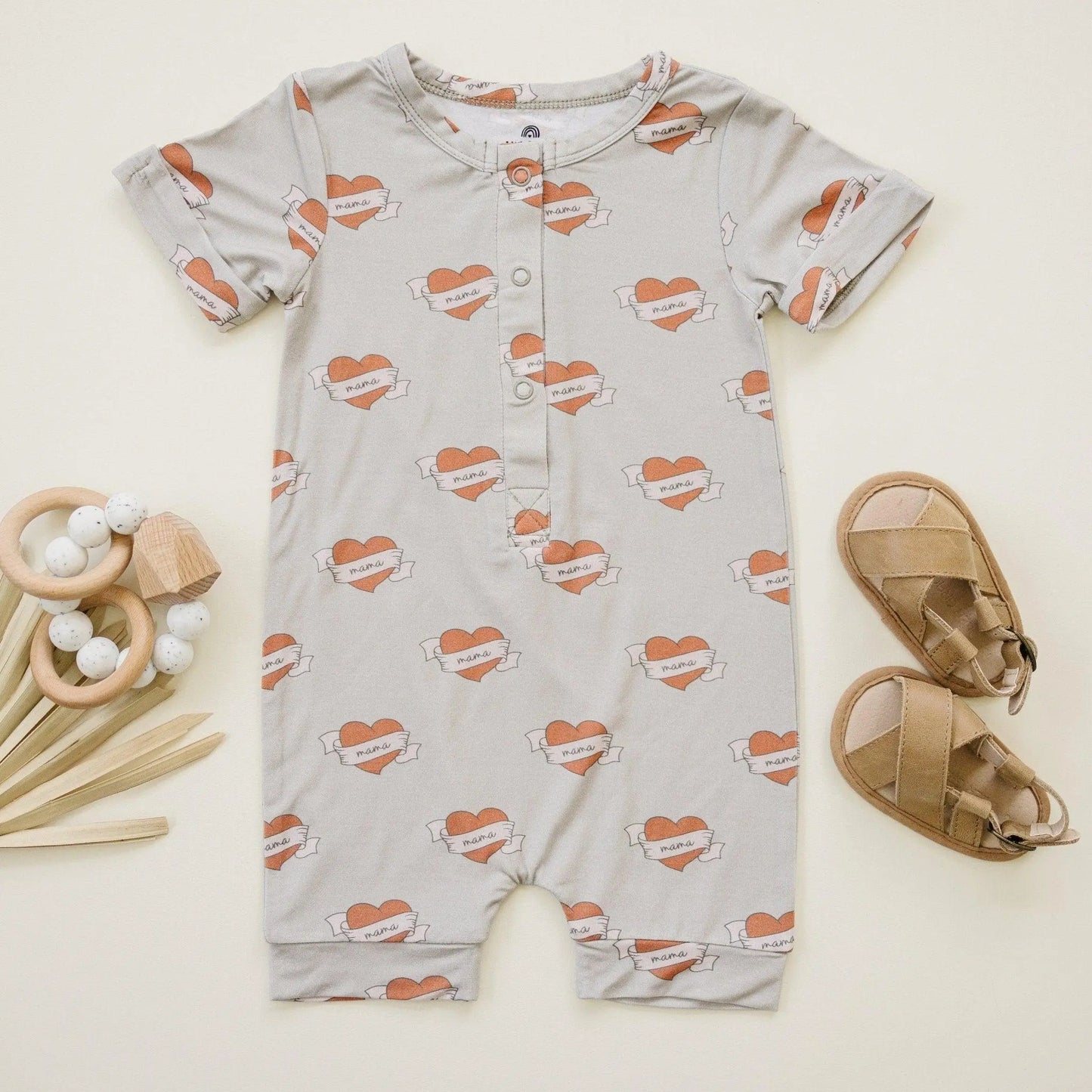 Little Joy Co. Mama Tattoo Hearts Bamboo Henley Romper for Babies - Apparel & Accessories > Clothing > Baby & Toddler Clothing > Baby One-Pieces