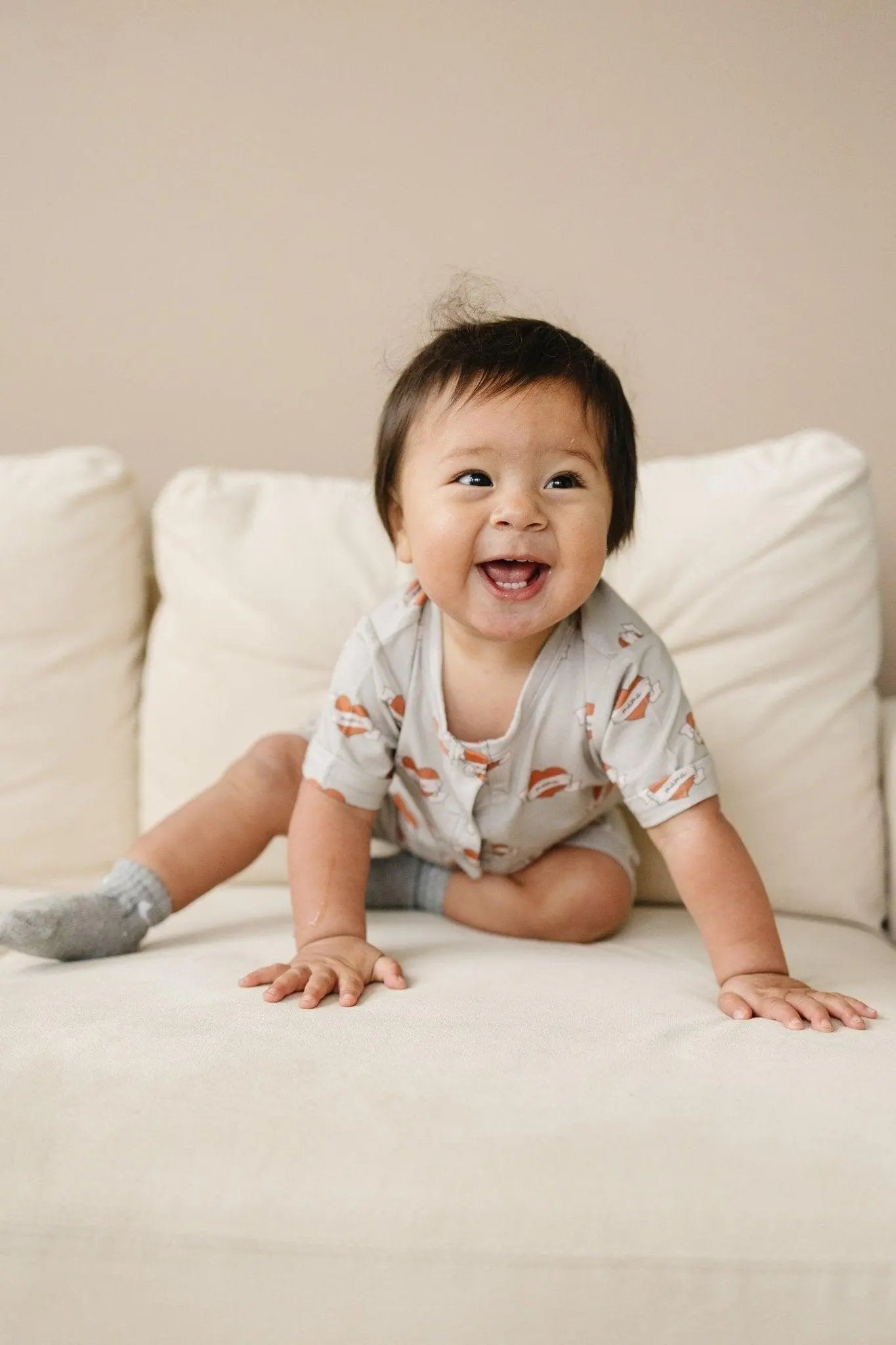 Little Joy Co. Mama Tattoo Hearts Bamboo Henley Romper for Babies - Apparel & Accessories > Clothing > Baby & Toddler Clothing > Baby One-Pieces