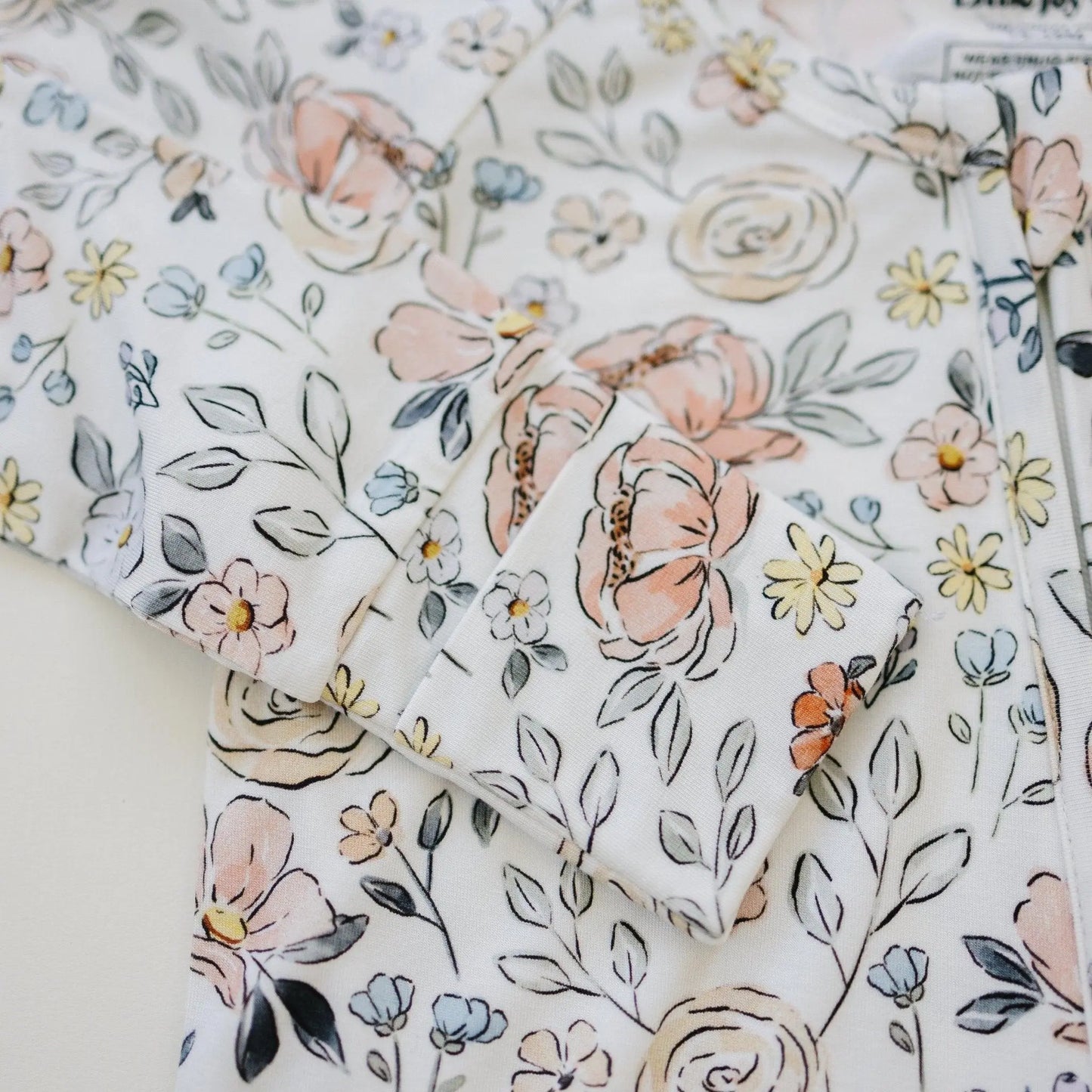 Pastel Petals Modal Zippy Romper For Baby With Feet Little Joy Co. Everetts Place: Online Boutique