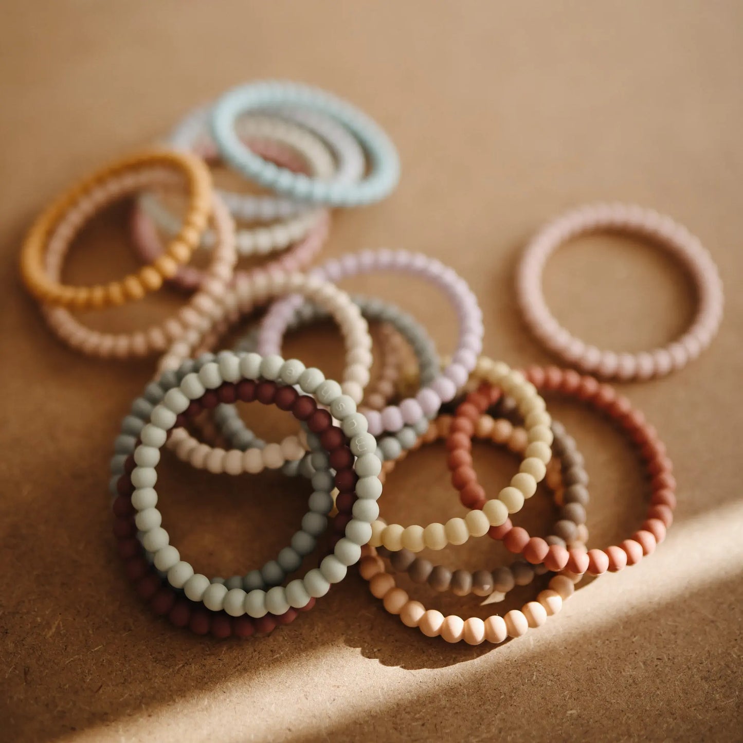 Pearl Teether Bracelet for Babies Non-Toxic Food-Grade Silicone Easy Grip Soothing Accessory Mushie Everetts Place: Online Boutique
