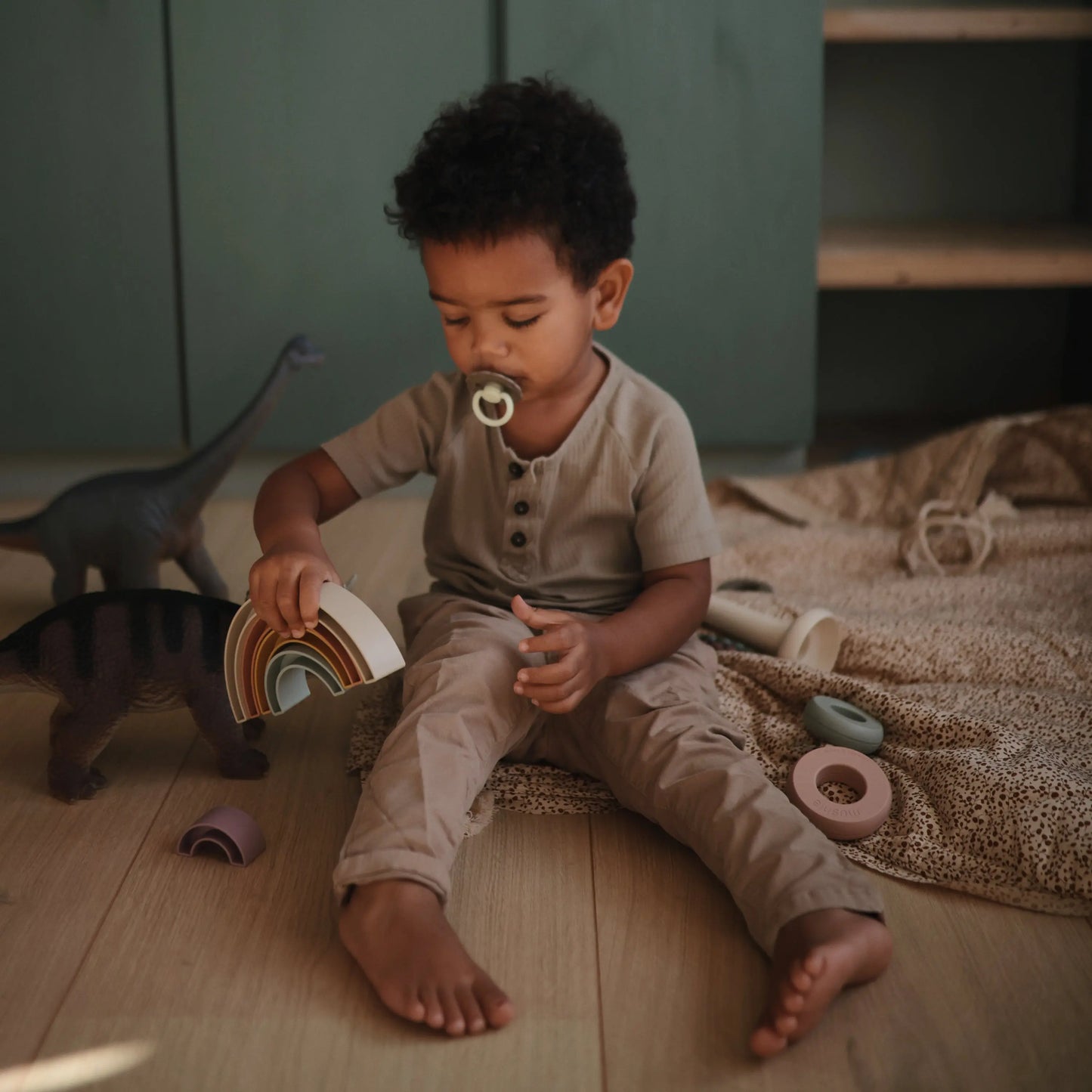 Rainbow Stacker Toy from Danish Hygge Collection for Learning and Play Mushie Everetts Place: Online Boutique