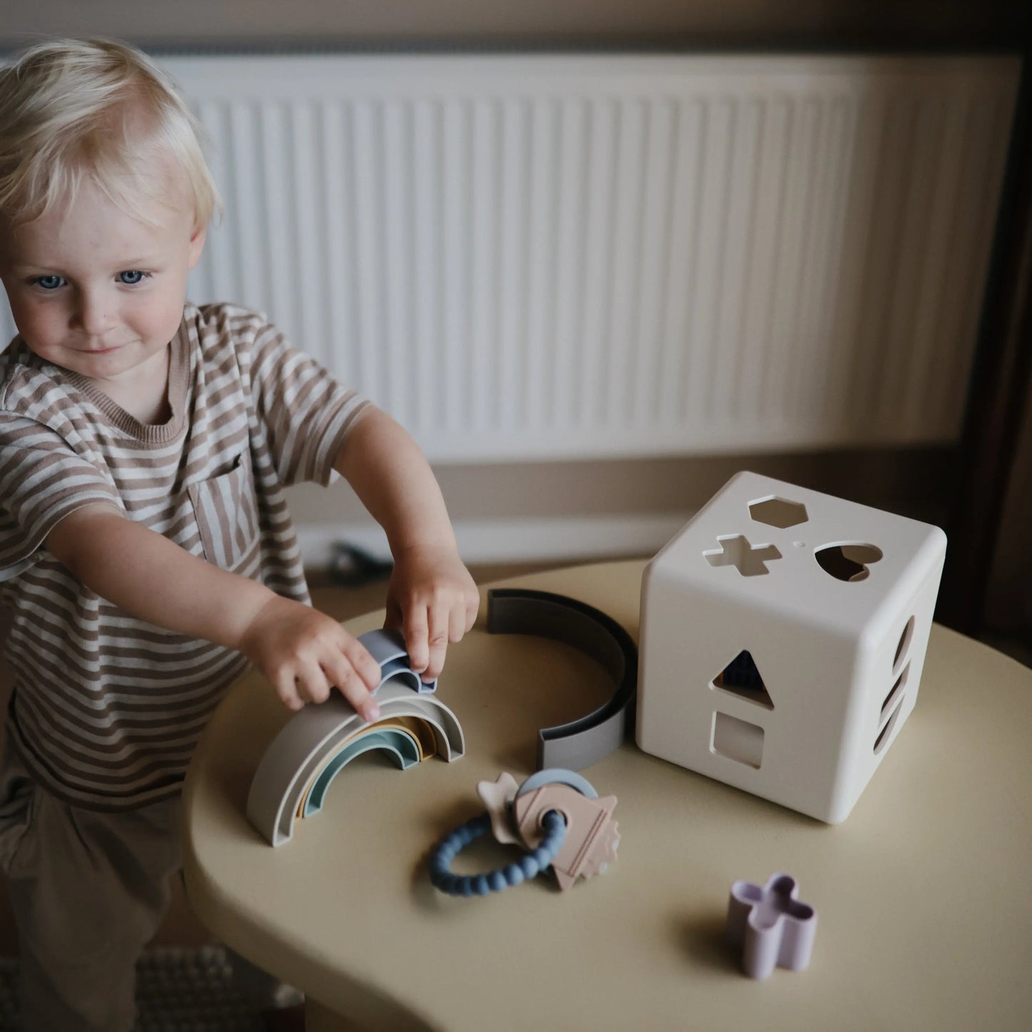 Rainbow Stacker Toy from Danish Hygge Collection for Learning and Play Mushie Everetts Place: Online Boutique