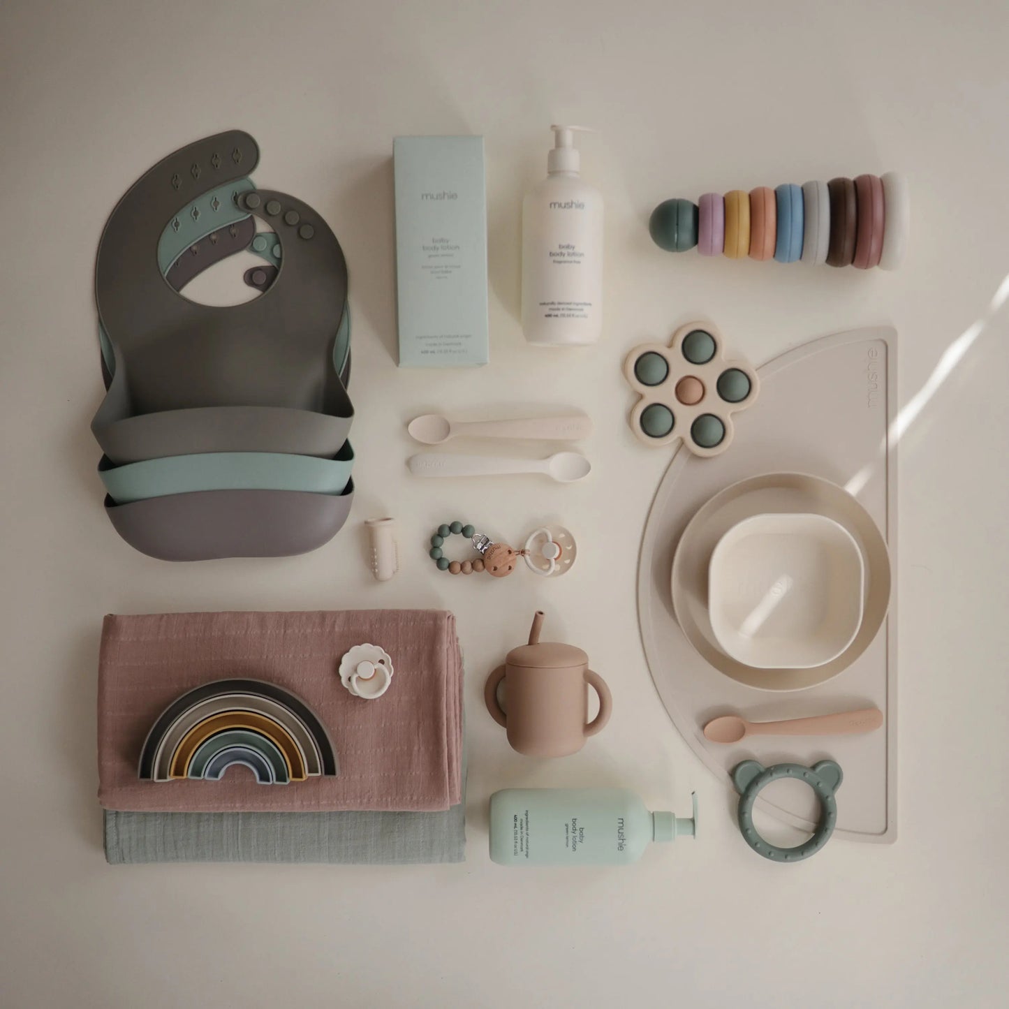 Rainbow Stacker Toy from Danish Hygge Collection for Learning and Play Mushie Everetts Place: Online Boutique