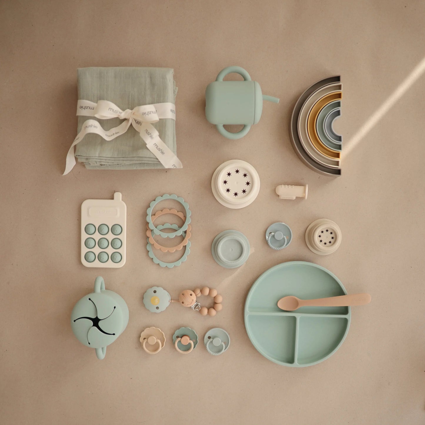 Rainbow Stacker Toy from Danish Hygge Collection for Learning and Play Mushie Everetts Place: Online Boutique