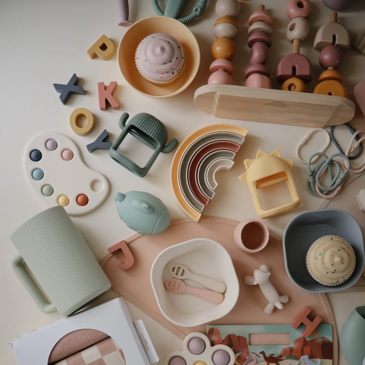 Rainbow Stacker Toy from Danish Hygge Collection for Learning and Play Mushie Everetts Place: Online Boutique
