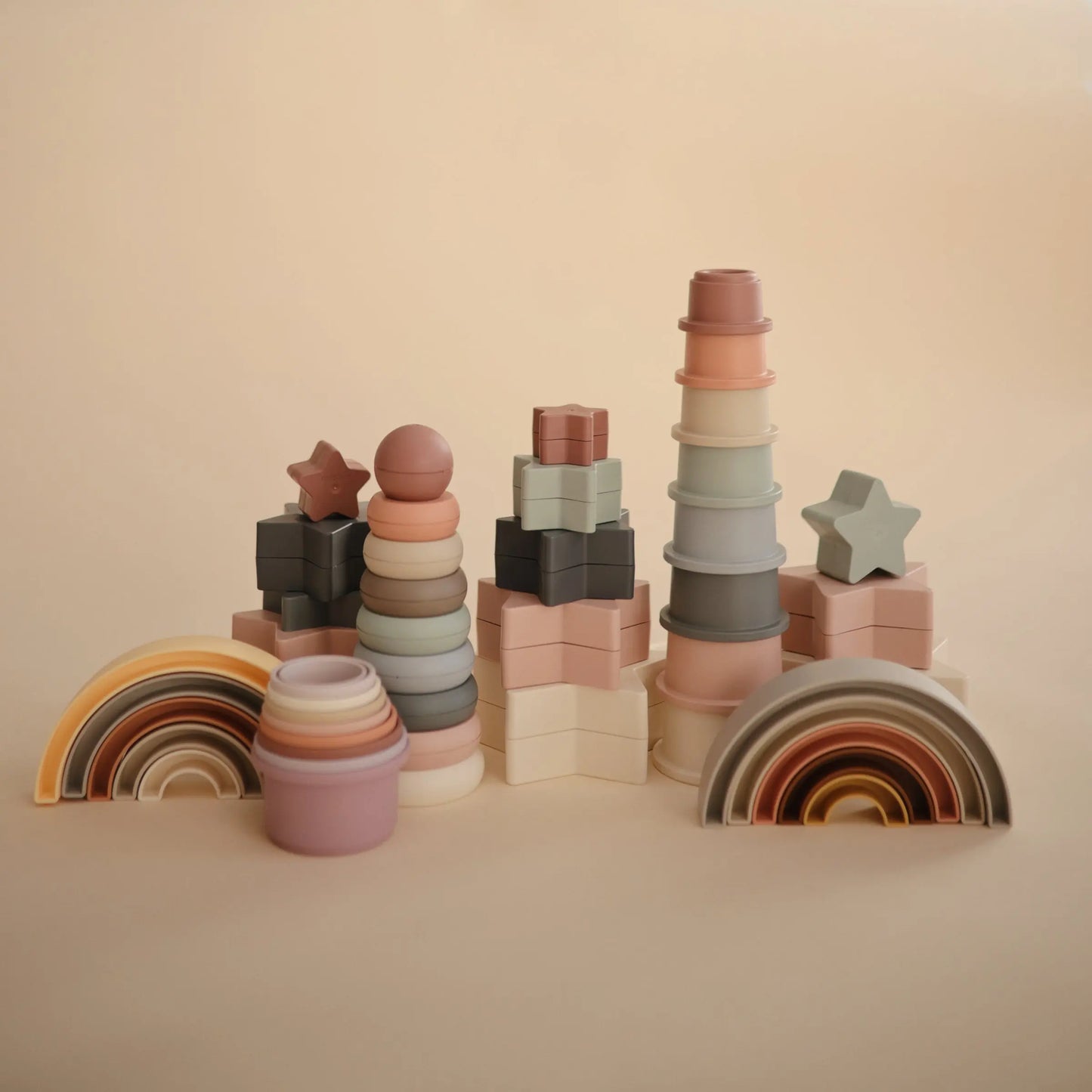 Rainbow Stacker Toy from Danish Hygge Collection for Learning and Play Mushie Everetts Place: Online Boutique
