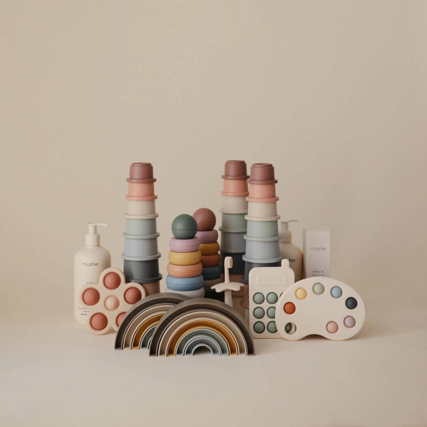 Rainbow Stacker Toy from Danish Hygge Collection for Learning and Play Mushie Everetts Place: Online Boutique