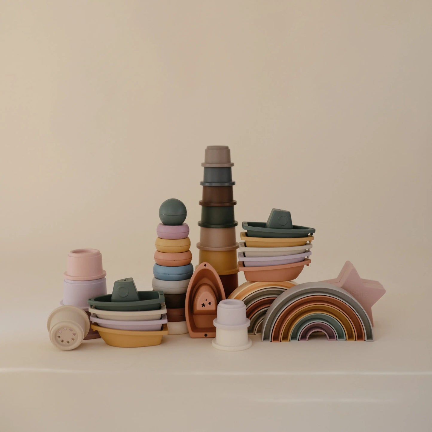 Rainbow Stacker Toy from Danish Hygge Collection for Learning and Play Mushie Everetts Place: Online Boutique
