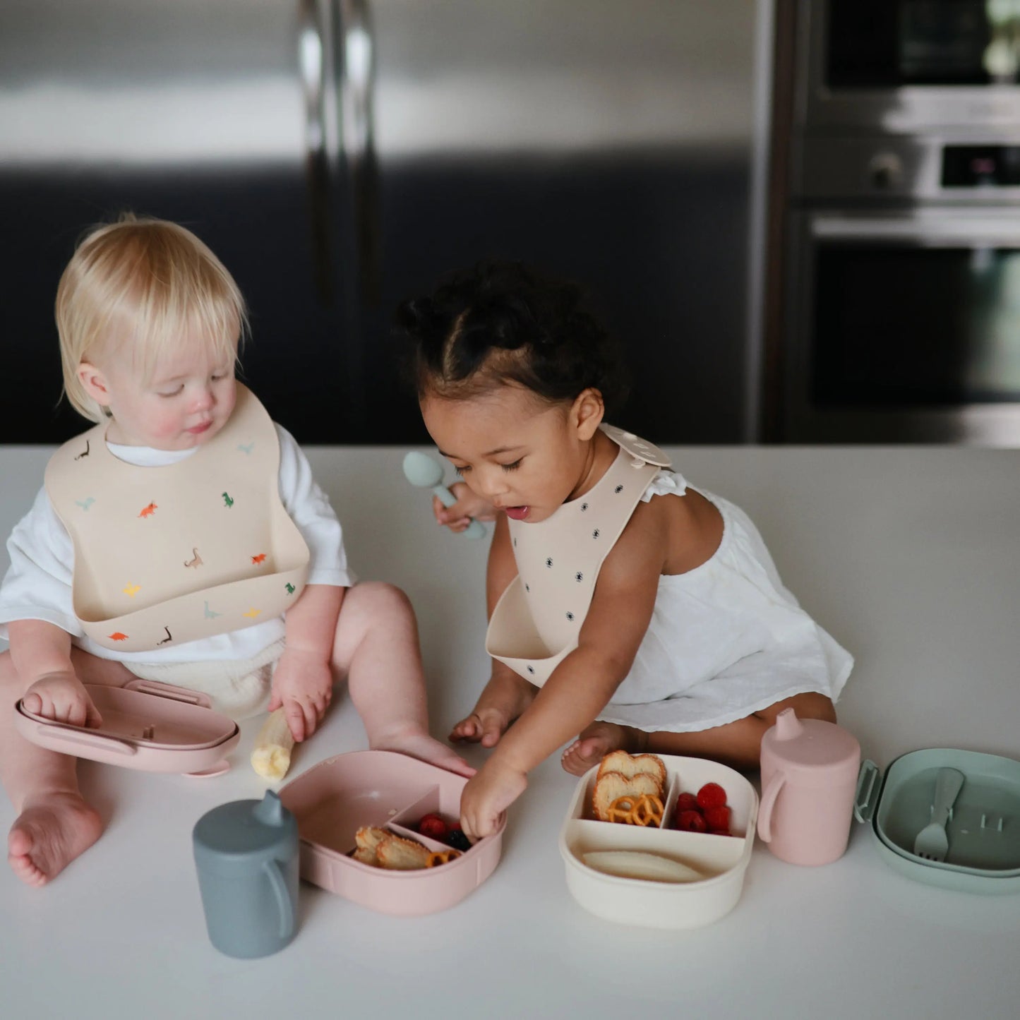 Silicone Baby Bib with Adjustable Neck Strap and Front Pocket for Easy Cleaning Mushie Everetts Place: Online Boutique