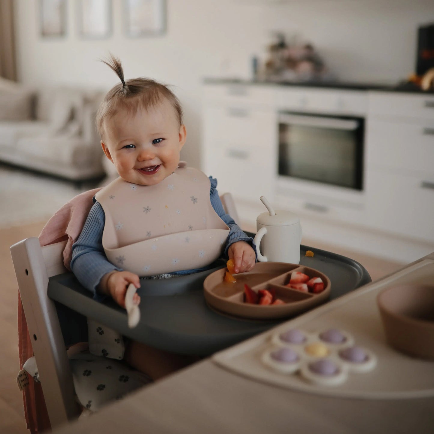Silicone Baby Bib with Adjustable Neck Strap and Front Pocket for Easy Cleaning Mushie Everetts Place: Online Boutique