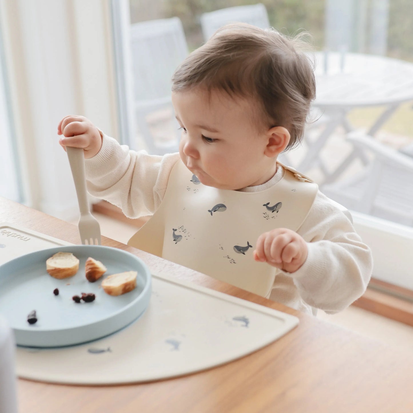 Silicone Baby Bib with Adjustable Neck Strap and Front Pocket for Easy Cleaning Mushie Everetts Place: Online Boutique