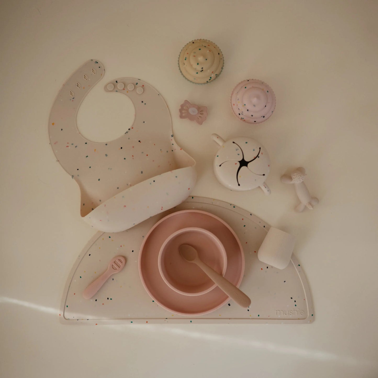 Silicone Baby Bib with Adjustable Neck Strap and Front Pocket for Easy Cleaning Mushie Everetts Place: Online Boutique