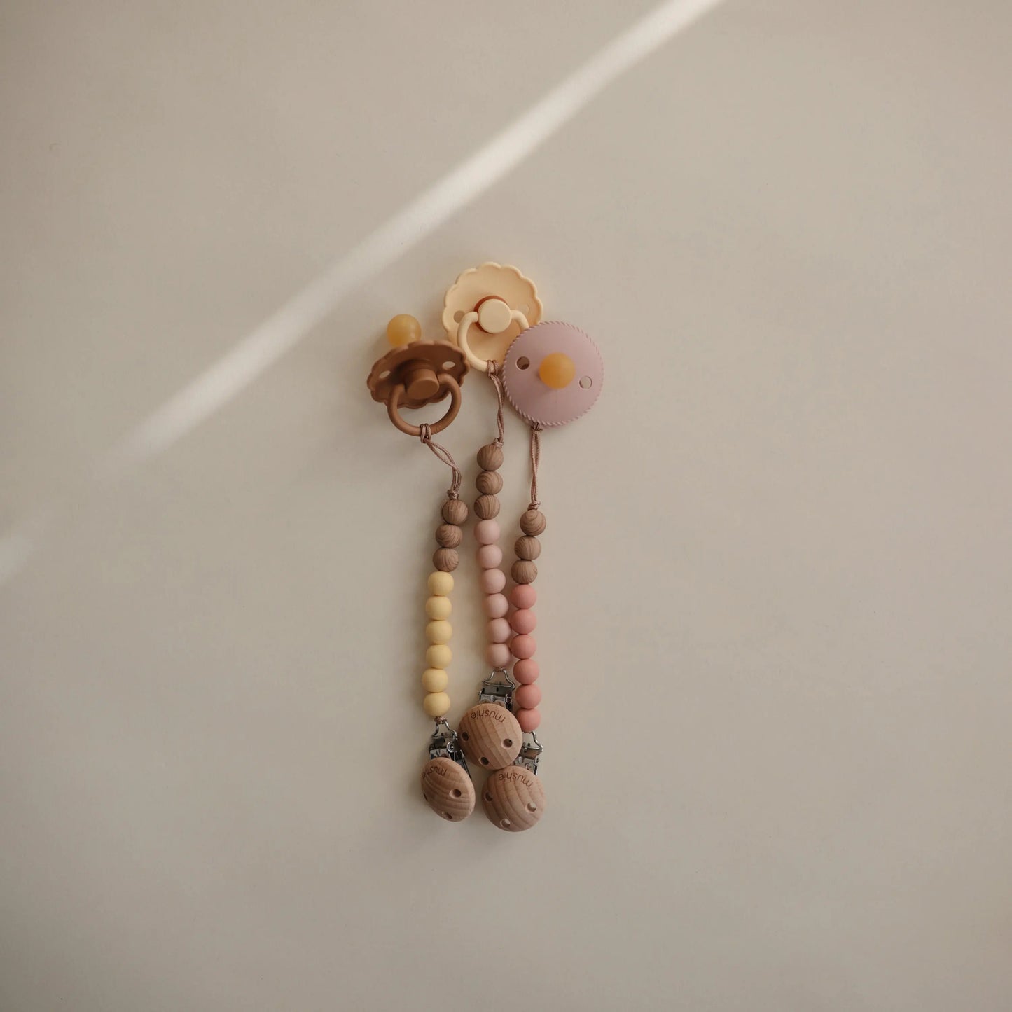 Silicone Pacifier Clip Eva with Faux Wood Clasp and Colorful Beads Mushie Everetts Place: Online Boutique