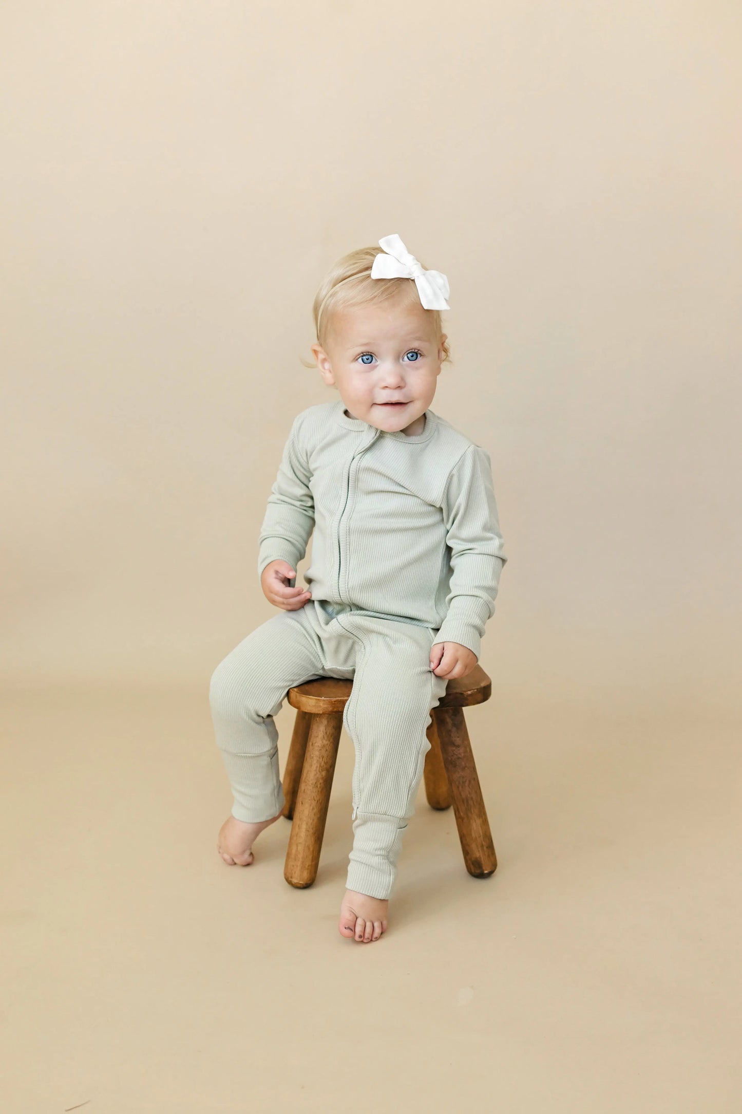 Solid Ribbed Bamboo Zippy Romper for Babies in Colors Little Joy Co. Everetts Place: Online Boutique