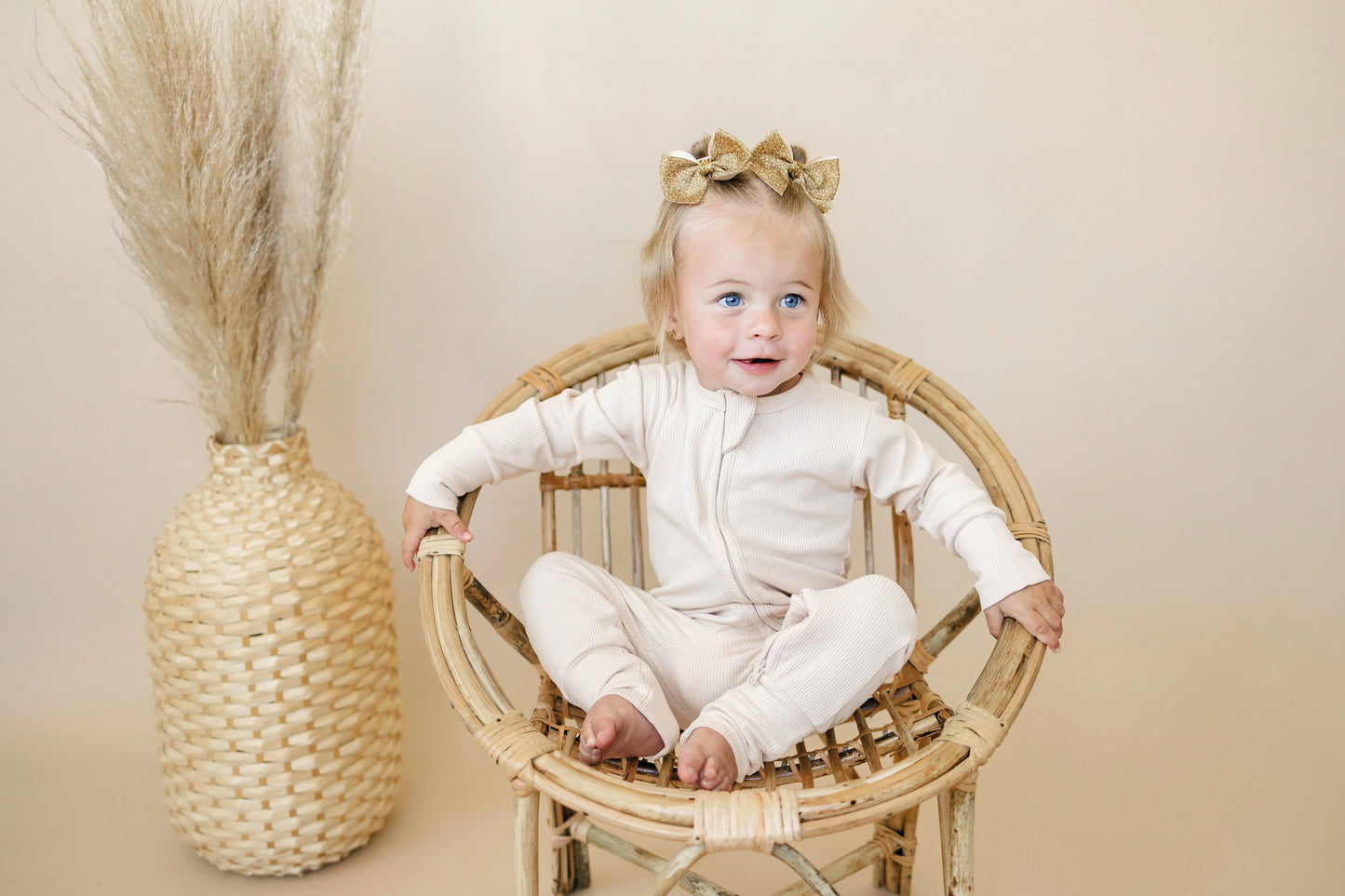 Solid Ribbed Bamboo Zippy Romper for Babies in Colors Little Joy Co. Everetts Place: Online Boutique
