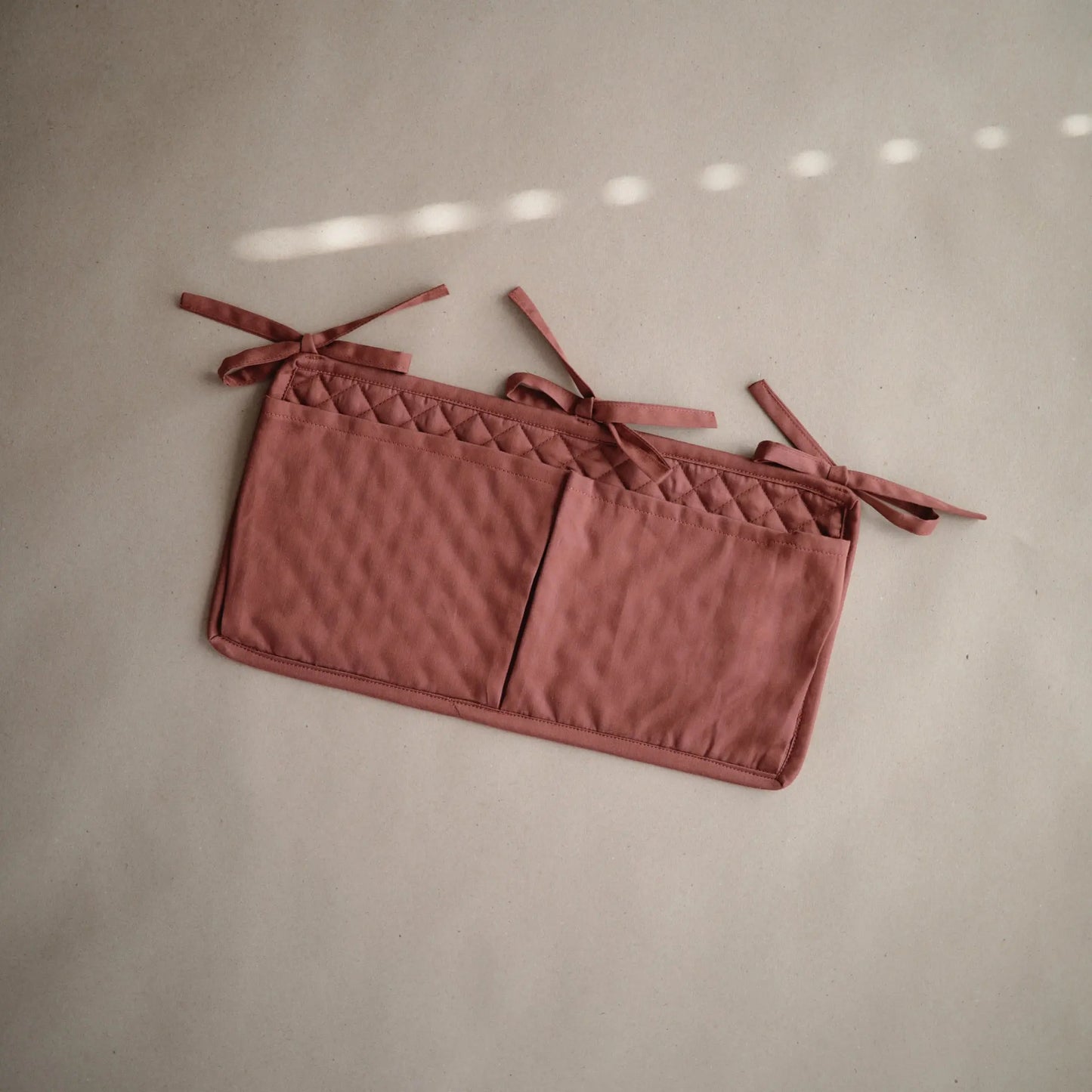 Storage Pocket for Baby Essentials with Adjustable Ribbon Ties Mushie Everetts Place: Online Boutique