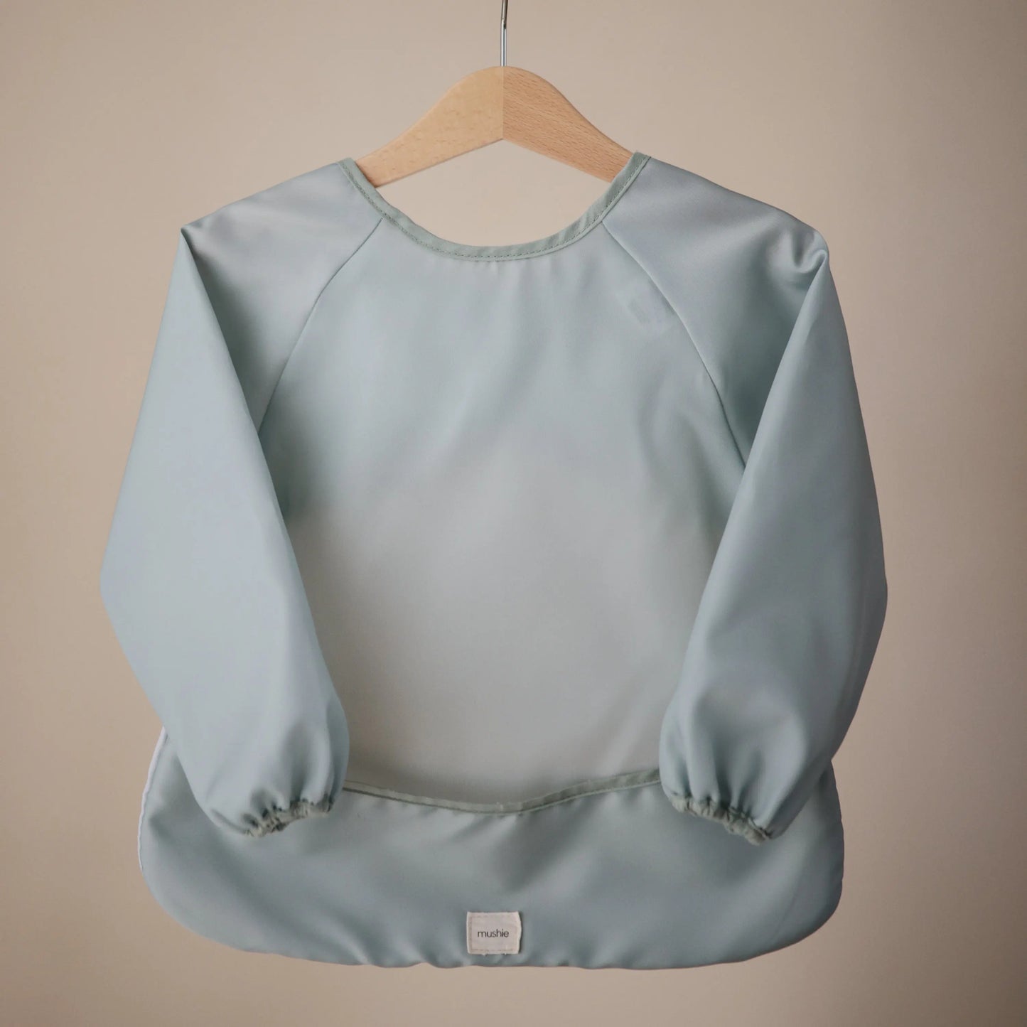 Water Resistant Long Sleeve Bib for Kids with Wide Pocket and Velcro Closure Mushie Everetts Place: Online Boutique