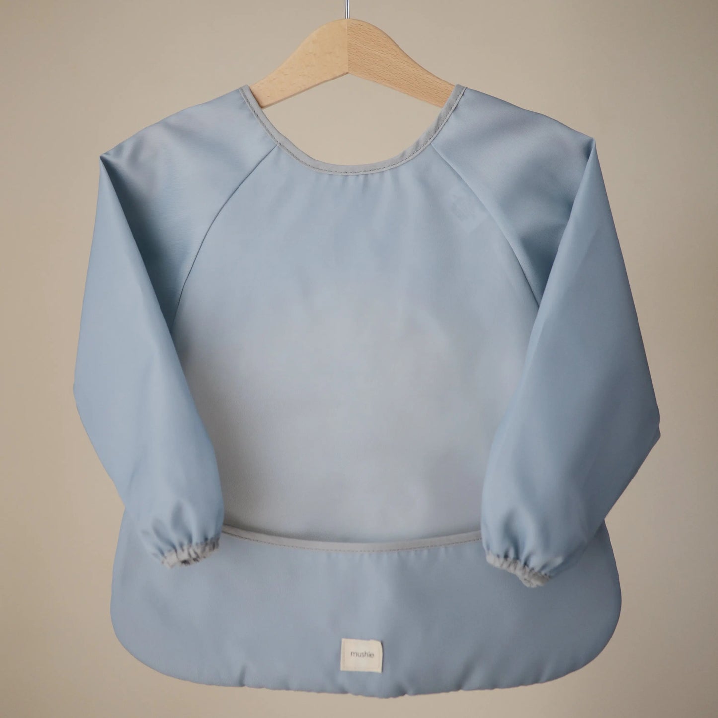 Water Resistant Long Sleeve Bib for Kids with Wide Pocket and Velcro Closure Mushie Everetts Place: Online Boutique