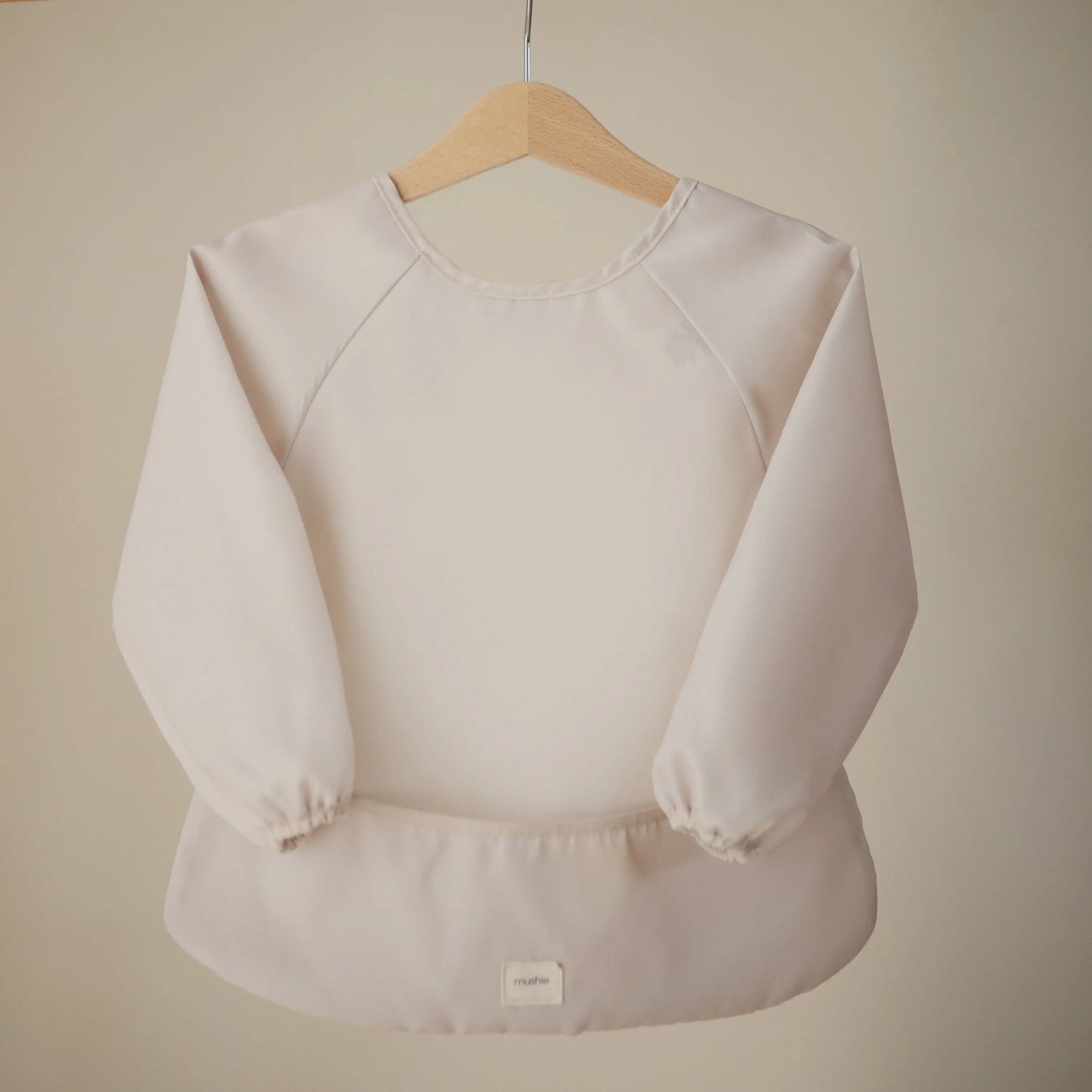 Water Resistant Long Sleeve Bib for Kids with Wide Pocket and Velcro Closure Mushie Everetts Place: Online Boutique