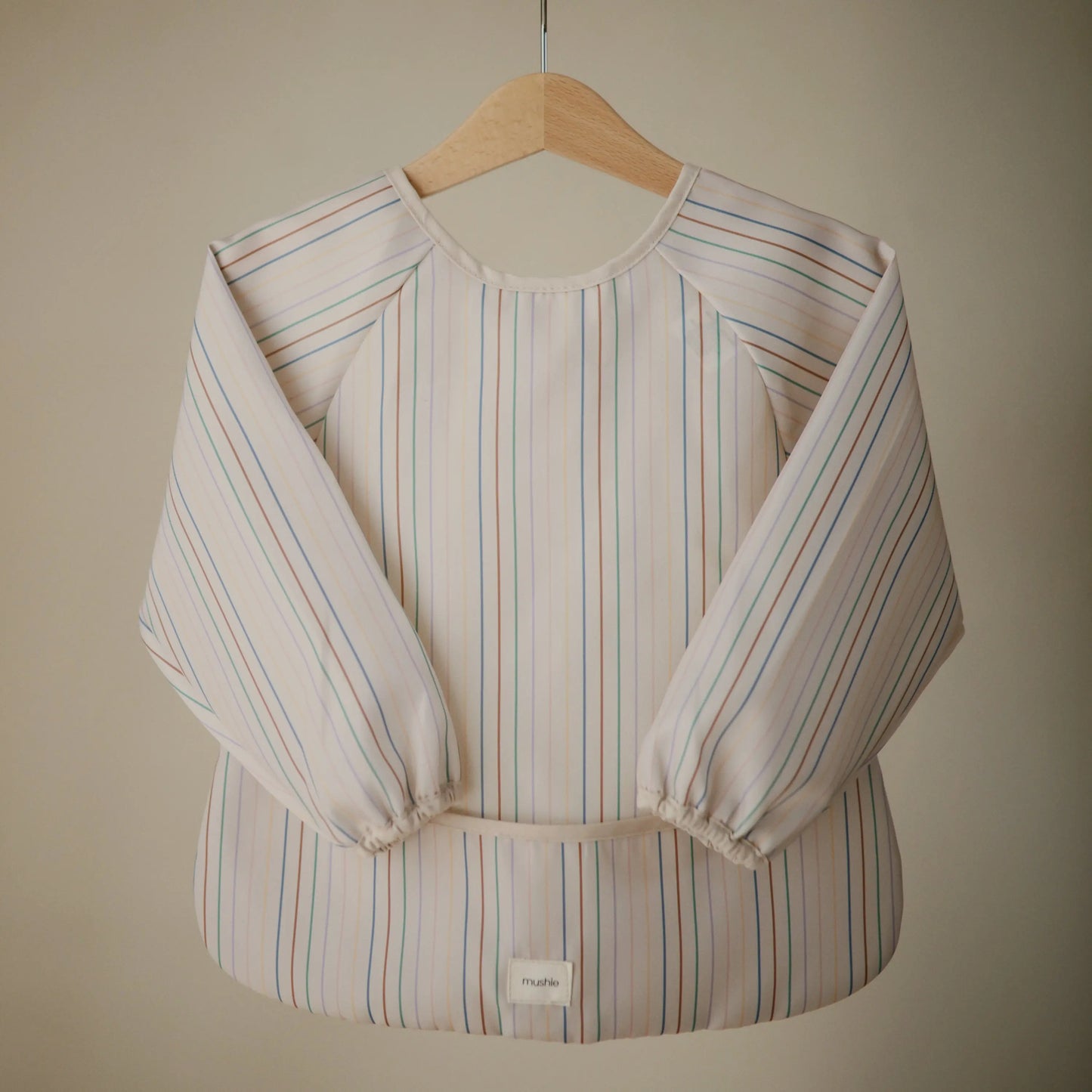 Water Resistant Long Sleeve Bib for Kids with Wide Pocket and Velcro Closure Mushie Everetts Place: Online Boutique