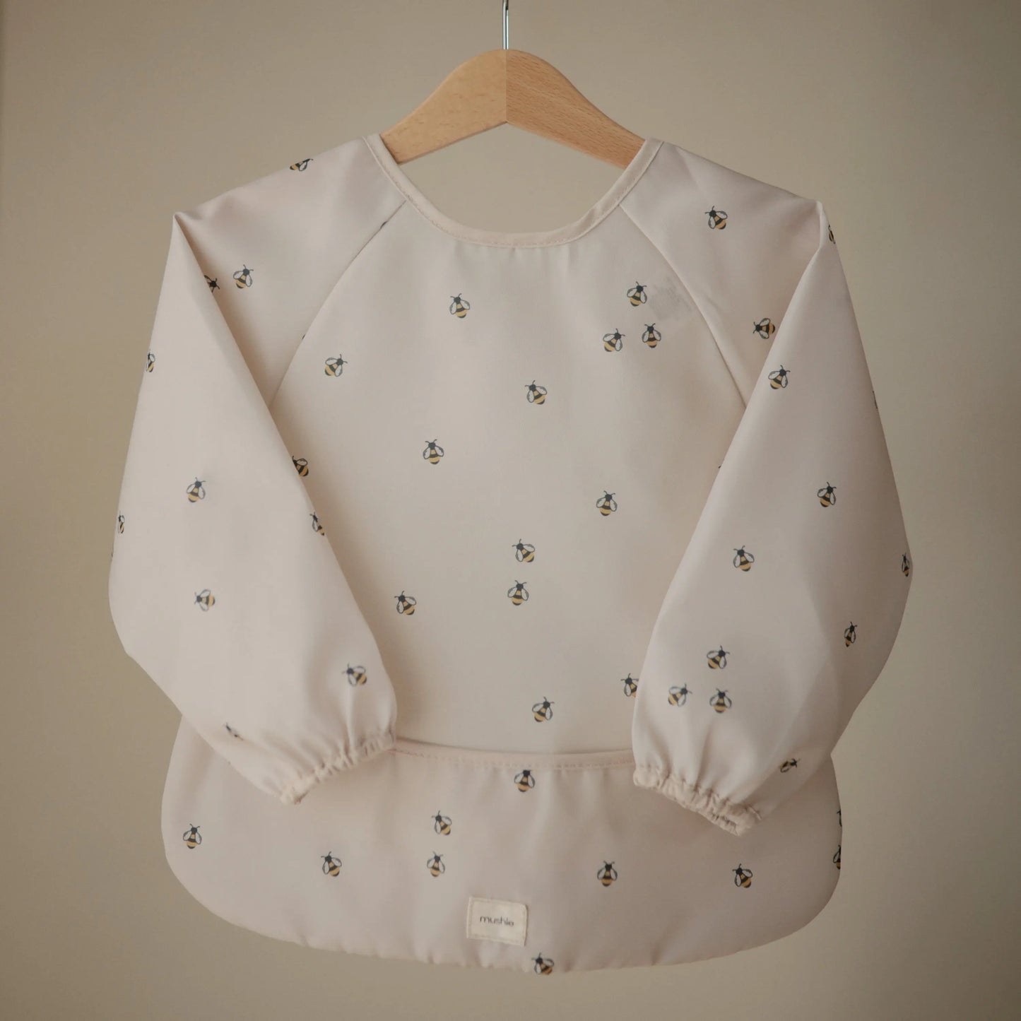 Water Resistant Long Sleeve Bib for Kids with Wide Pocket and Velcro Closure Mushie Everetts Place: Online Boutique