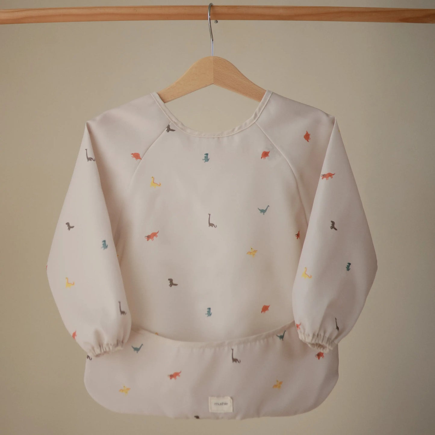 Water Resistant Long Sleeve Bib for Kids with Wide Pocket and Velcro Closure Mushie Everetts Place: Online Boutique
