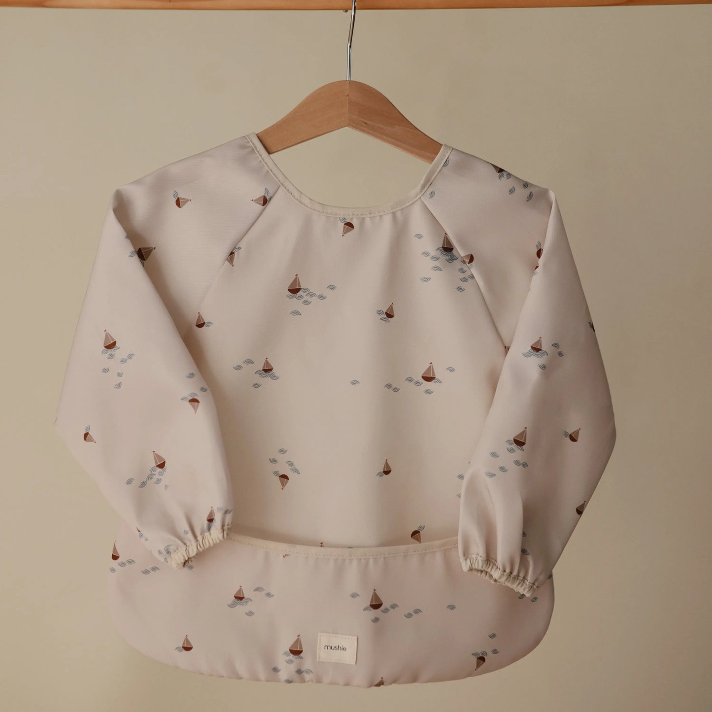 Water Resistant Long Sleeve Bib for Kids with Wide Pocket and Velcro Closure Mushie Everetts Place: Online Boutique