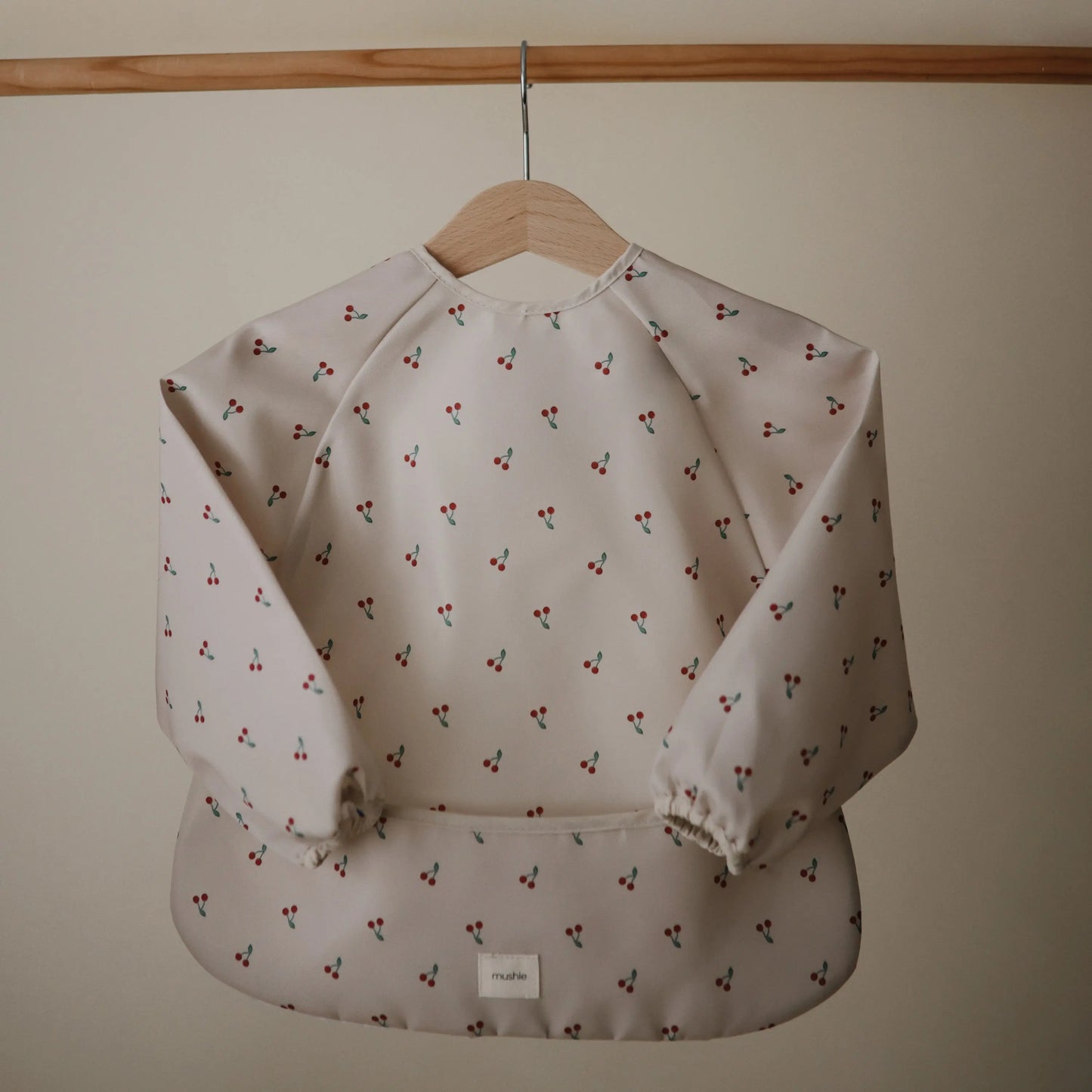 Water Resistant Long Sleeve Bib for Kids with Wide Pocket and Velcro Closure Mushie Everetts Place: Online Boutique