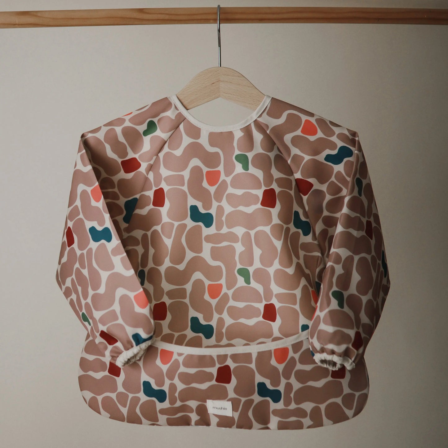 Water Resistant Long Sleeve Bib for Kids with Wide Pocket and Velcro Closure Mushie Everetts Place: Online Boutique
