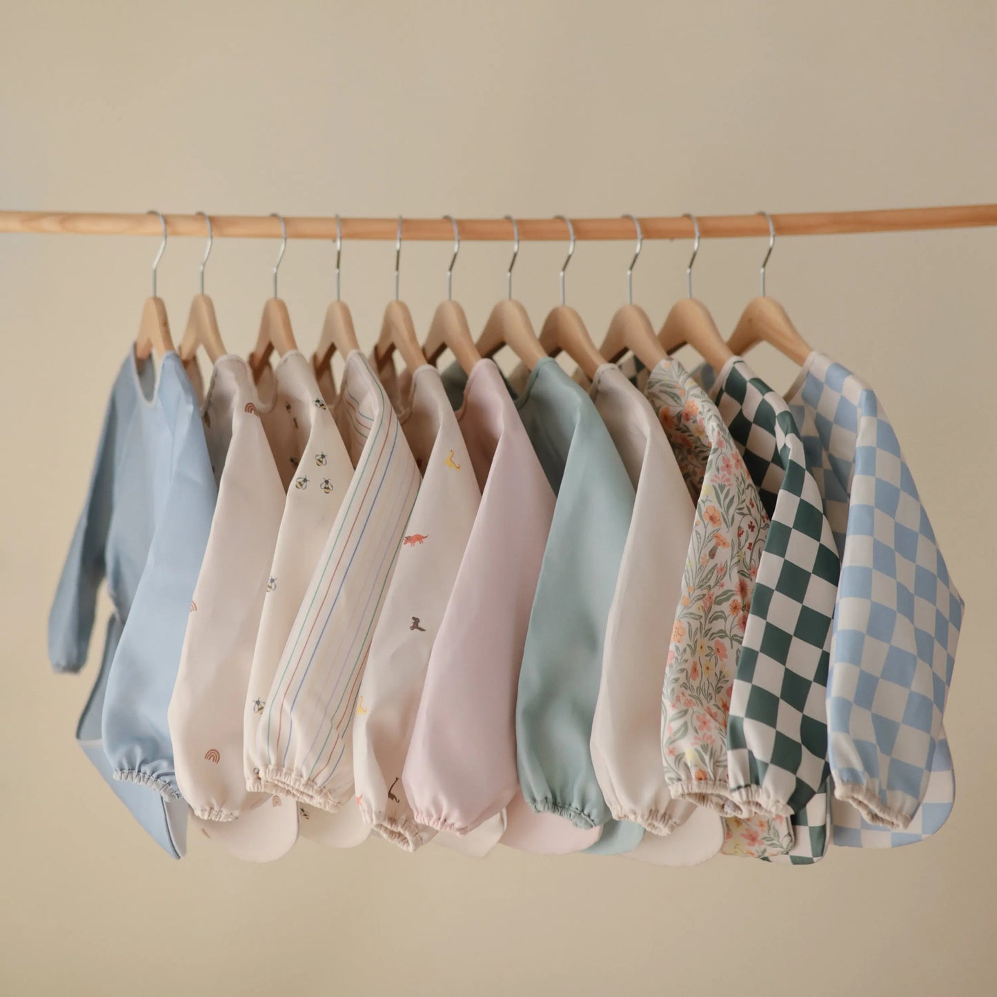 Water Resistant Long Sleeve Bib for Kids with Wide Pocket and Velcro Closure Mushie Everetts Place: Online Boutique
