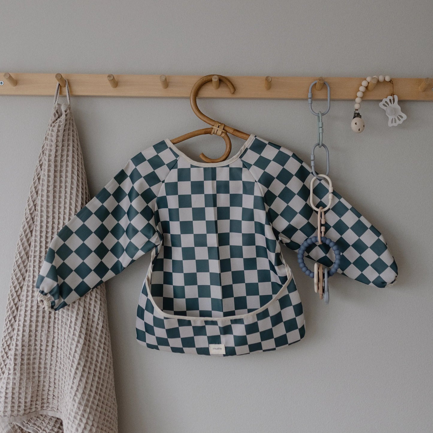 Water Resistant Long Sleeve Bib for Kids with Wide Pocket and Velcro Closure Mushie Everetts Place: Online Boutique